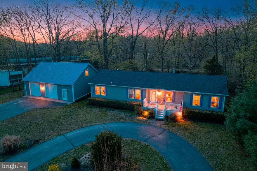 Spacious 3-bedroom, 2.5-bath rancher with pole barn on the upper Chester River!
Step inside this private waterfront retreat to a welcoming living room featuring a cozy propane fireplace with a beautiful stone surround. The spacious primary suite offers an oversized bathroom with a garden tub beside a second gas fireplace, a walk-in shower, and a separate water closet.

The dining room opens to a back deck overlooking the river, complete with a retractable awning—perfect for relaxing and enjoying the water views. The kitchen is designed for both function and style, featuring an island, double ovens, and a large stainless farmhouse sink with views of the river. Two additional bedrooms share a full bath. Just off the kitchen is the laundry room along with a convenient half bath.

A breezeway connects the home to an impressive 1,200 sq. ft. pole barn, which includes stairs to a second level and a motorized lift for easily moving items upstairs. The home has been meticulously maintained, including regular HVAC servicing, resealed blacktop driveways, and proactive updates like replacing the water heater.

Enjoy life on the river—perfect for kayaking, fishing, and even crabbing from your own property. The home sits elevated on a hill well above the floodplain.  Buyers may have the option to add steps down to the water and potentially a bulkhead or small pier (to be confirmed with the county).

Conveniently located with quick access to Rt. 301 for commuting to Middletown ( 16 miles), Chestertown ( 12 miles), or the Chesapeake Bay Bridge ( 40 miles). Food Lion is also less than a mile away. The property is serviced by public water and sewer and also includes a well for irrigation. Professionally landscaped and being freshened up for spring—be sure to add this one to your watch list!