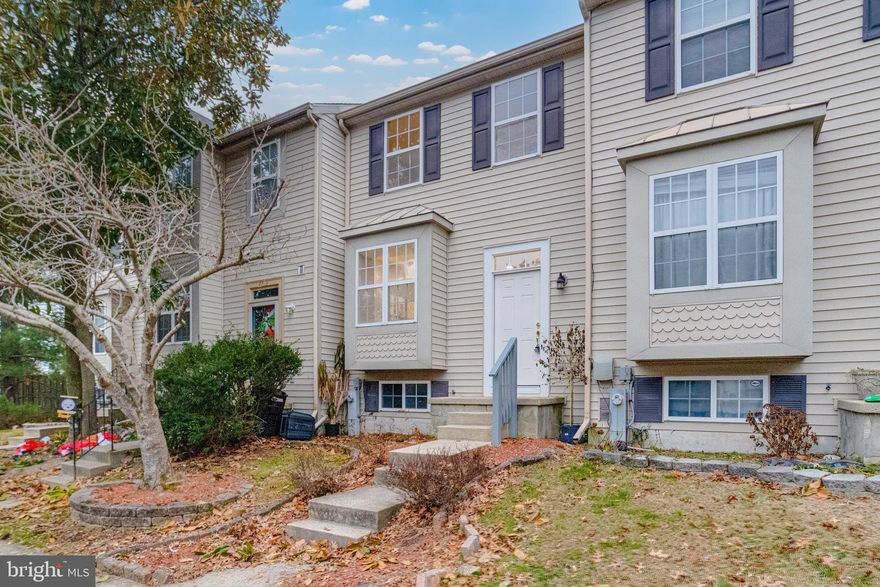 Beautifully updated townhome offering comfort and versatility. This 3-bedroom, 2 full-bath, 1 half-bath home features a newer roof and HVAC, all-new flooring, fresh interior paint, and an updated kitchen with granite countertops and brand-new appliances. The fully finished lower level is ideal for a guest or in-law suite and includes a rear ground-level entrance with a porch. Enjoy bright living spaces, generous bedrooms, a deck for entertaining, and a fenced backyard. Conveniently located near shopping, dining, and major commuter routes—move-in ready and a must-see!