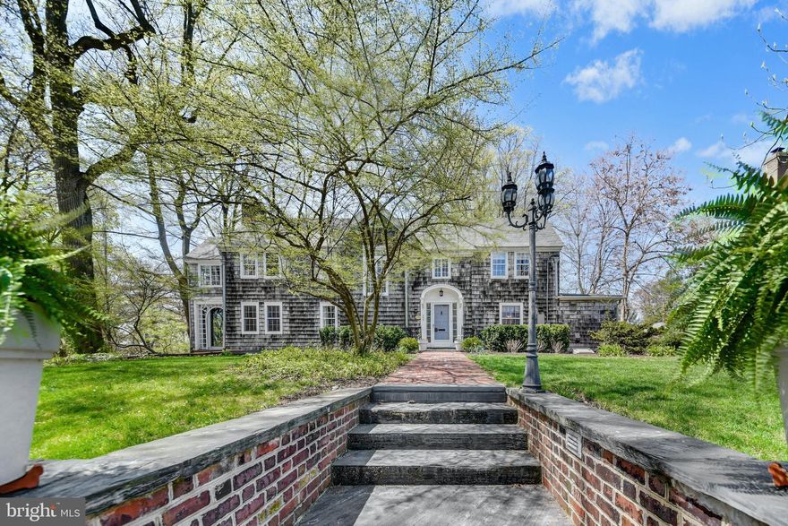 Showings start 4/30.      Sheltered amidst old landscaping and a canopy of mature trees, this architectural gem enjoys a premier location in Bethlehem’s distinguished Historic District. The land deed dates to William Chapman in 1868, where an original brick home was eventually replaced in 1917 with a New England shingle-style home. Notably one of the great houses of the area, it is prominently positioned on a corner lot.
     Refinished hardwood floors, fresh paint, and a newly remodeled kitchen are just a few of the upgrades made in recent years. Spacious formal rooms are cozy with built-ins, wood-burning fireplaces, and romantic nooks and crannies. A light-filled sunroom and conservatory with vaulted glass ceiling lead to a heated indoor pool and spa, with kitchenette and adjacent full bath. The roof and walls open to the fresh air and a fabulous sandstone patio with built-in adobe oven, perfect for entertaining family and friends.
     The second floor has a master bedroom suite with a large walk-in closet and tiled bath. Three additional bedrooms, two baths and an office complete the second floor, while the lower level has a recreation room, full bath, and additional space for hobbies and storage. This wonderful property has all the vintage appointments you would expect, plus a large backyard, 2-car garage and private driveway.
