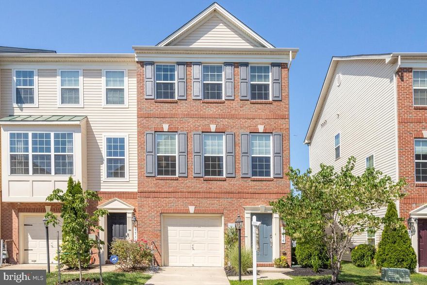 Gorgeous Brick 3 Bedroom, 2 Full & 2 Half Bathrooms Townhouse with 1 Car Garage Ready for you to move in!  Beautiful Wide Plank Hardwood Flooring throughout the Spacious Living Room, Dinning Room and Kitchen.   Amazing Gourmet Kitchen featuring Granit Counters, Stainless Steel Appliances, Island and Slider leading to the Deck perfect for Grilling.  Stunning Primary Bedroom with Vaulted Ceilings, Walk In Closet and Luxurious Bathroom with Garden Soaking Tub and Separate Shower.  Bonus Lower Level Recroom with Slider to the rear yard.  Fabulous Newer Home (2014) with a bathroom on every level and lots of Upgrades for that Special Touch. Community Amenities featuring an Outdoor Community Pool, Clubhouse and Tot Lot.  Conveniently located near Arundel Mills Mall, other close by shopping & Entertainment. 15 minutes to Fort Meade/NSA & BWI Airport, 30 Minutes to Downtown Baltimore & Annapolis.  Within minutes to Major Commuter Routes 100, 97 and 295.