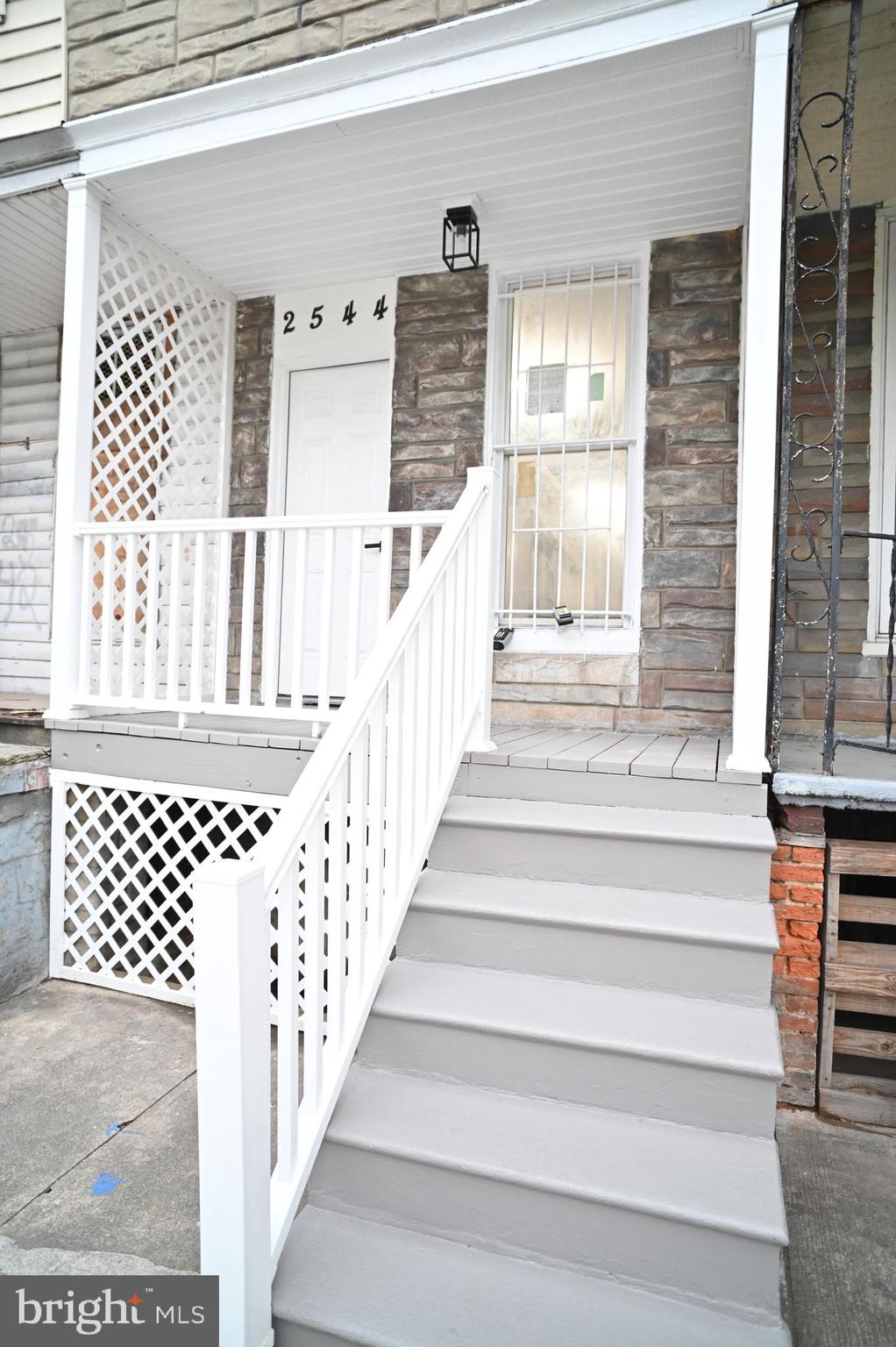 This renovated 2BR/1.5BA little beauty is located in the Penn North neighborhood. The front door opens to plenty of green space with only a few short steps to Druid Hill Park, Rawlings Conservatory, Druid Hill Lake, and Baltimore Zoo. Step into a home filled with natural light, a freshly painted interior with a modern color palette, and luxury flooring throughout. The main floor offers a comfortable living room, intimate dining space, and a newly remodeled kitchen. The kitchen offers plenty of cabinets, stainless steel appliances, granite countertops with a tiled backsplash, and a deep ceramic sink. From the kitchen, step outside to a cozy fenced yard with space for a parking pad and so many more possibilities.
With updated features and systems like a new HVAC, windows, hot water heater, plumbing, electrical, and newly coated roof. This home is ready for anyone looking for a cozy place to call home. It's close to shopping, public transportation, the art district, and city amenities. All this with the Baltimore Zoo and Druid Hill Park's walking loop right across the street and plans for a new, more pedestrian- and bike-friendly Druid Park Lake Drive underway.