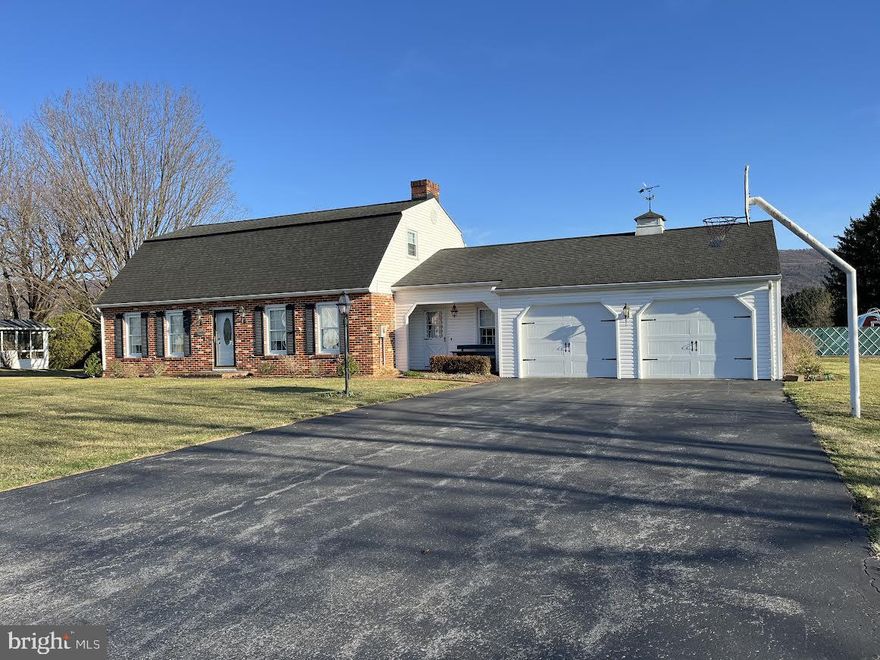 Dutch Colonial offers 4 bdrms, 2 bath, attached 2 car garage and in-ground pool.  Situated on a double lot, this 2 story features a family room with brick fireplace, eat-in kitchen, plus formal dining and living room.  Walk-in closets in owner's bedroom, shower stall in 1st floor bath and tub/shower combo in 2nd floor bath.  First floor laundry and large screen porch. Attic storage in eave and pull downstairs in garage.  All kitchen appliances & pool equipment included.