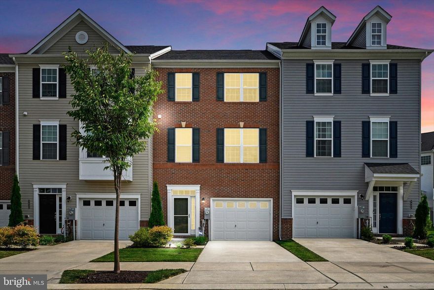 Welcome to 9634 Eaves Drive in the vibrant Ballard Green community! This modern townhome, constructed in 2018, offers a perfect blend of convenience and elegance. Let's take a closer look at what this stunning property has to offer:

Step inside and discover the main level, which boasts a spacious recreation room, versatile enough to be used as an additional bedroom, complete with its own door and a full attached bathroom. From here, you can easily access the rear patio, creating a seamless indoor-outdoor flow.

Ascend to the upper level, where an open floor plan awaits. The living room, kitchen, and dining room come together harmoniously, providing ample space for relaxation and entertainment. The kitchen is a chef's dream, featuring beautiful white shaker cabinets, granite countertops, stainless steel appliances, a pantry, and a convenient island for breakfast or casual meals.

Entertaining guests is a breeze with the sliding glass door off the dining room, leading to a spacious rear deck, perfect for hosting gatherings and enjoying outdoor grilling.

On the 2nd upper level, you'll find three well-appointed bedrooms, including the luxurious primary suite. The primary bedroom offers a walk-in closet and an attached bathroom with a soaking tub, dual sinks, and a stall shower, providing a private oasis to unwind after a long day.

Step into any of the bathrooms, and you'll be greeted by the sophisticated charm and practicality of ceramic tile flooring. Not only does it elevate the visual appeal of each bathroom, but it also offers easy cleaning and maintenance, ensuring a lasting and beautiful finish for years to come.

Additionally, this townhome includes a 1-car attached garage with interior access, making parking and storage a breeze.

The Ballard Green community offers an array of exciting amenities, including a community center for social gatherings, a tot lot for the little ones, and a magnificent inground pool and kiddie pool, perfect for those warm summer days.

Don't miss the opportunity to make 9634 Eaves Drive your new home, where modern living and community charm converge. Schedule your visit today!