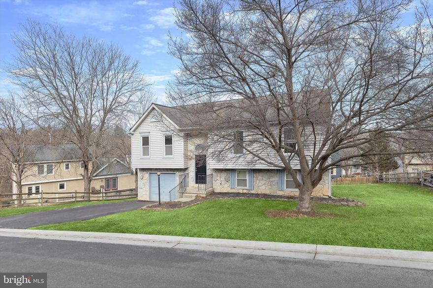 Welcome to 6653 E Lakeridge Road, nestled in the heart of the vibrant Lake Linganore community. Bright, spacious interiors define the home, creating an open and airy feel throughout. Step inside to the living room, where soaring vaulted ceilings and rich wide-plank laminate flooring set the stage for comfortable everyday living. The heart of the home is the eat-in kitchen, featuring newly painted cabinetry, a center island with breakfast bar, skylight, pantry, and a casual dining area with direct access to the deck perfect for entertaining or enjoying quiet mornings. The primary bedroom offers vaulted ceilings and a private en-suite bath, while two additional bedrooms, each with vaulted ceilings, share a full hall bath. The lower level provides convenient access to the attached garage, along with laundry and ample storage. Outside, the deck overlooks an expansive rear yard, ideal for relaxing or gathering with friends and family. Recent updates include luxury vinyl plank flooring, updated bathroom, and painted kitchen cabinetry.
Life at Lake Linganore brings resort-style amenities right to your doorstep, including private beaches, pools, clubhouses, boat ramps, piers, paddle sports, tennis and volleyball courts, disc golf, tot lots, summer concerts, farmers markets, and miles of scenic trails all just minutes from the shopping, dining, and entertainment of Frederick and Urbana, with easy access to I-70, MD-75, and Route 40 for an effortless commute.
Some photos have been virtually staged.