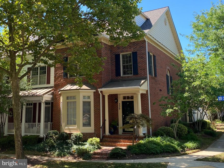 Welcome to this large end-unit Lakewood model townhouse with high-end finishes in Fallsgrove, a beautiful community with a recreation center, fitness rooms, outdoor pool, great shops & restaurants at nearby Fallsgrove Village Center, and miles of walking/biking trails. A covered front porch welcomes you to this elegant home, with an expansive main level with hardwood flooring, combined living and dining rooms, and a powder room. The gourmet kitchen with abundant storage and granite counters includes a built-in Sub-Zero refrigerator with 2 freezer drawers, a stainless steel gas stove with double ovens and a range hood, a microwave, a large island with farmhouse sink and a breakfast room with custom mural. The kitchen is open to a bright family room with gas fireplace, and is adjacent to the enclosed patio with a remote-controlled motorized awning. The main level also provides access to the 2-car garage. The front staircase leads from the living room up to the main bedroom area, with a very large primary bedroom with vaulted ceiling and ceiling fan, a double walk-in closet, and en suite primary bath with double sinks, a shower and separate soaking tub. There are 2 additional bedrooms, a hall bathroom and a laundry closet. From the main level breakfast room, the rear staircase leads up to a private bedroom or office with a half bath over the garage. This home is part of 3 HOAS (with a single monthly fee): Homes at Fallsgrove Owners' Assn, Fallsgrove Property Owners Assn, and Falls Grove Recreation Assn. One block away is the Fallsgrove Community Center, with an outdoor pool, tot lot, 2 fitness rooms, a card room, and a great room that is available for rental - all of which are available to you as a Recreation Assn member. The nearby Thomas Farm Community Center, run by the City of Rockville, offers offers classes for all ages,  drop-in sports, fitness center, ping pong tables, and more. Do not miss this wonderful move-in ready home!  New roof 2021, new HVAC 2020, new water heater 2018, gutters 2019.