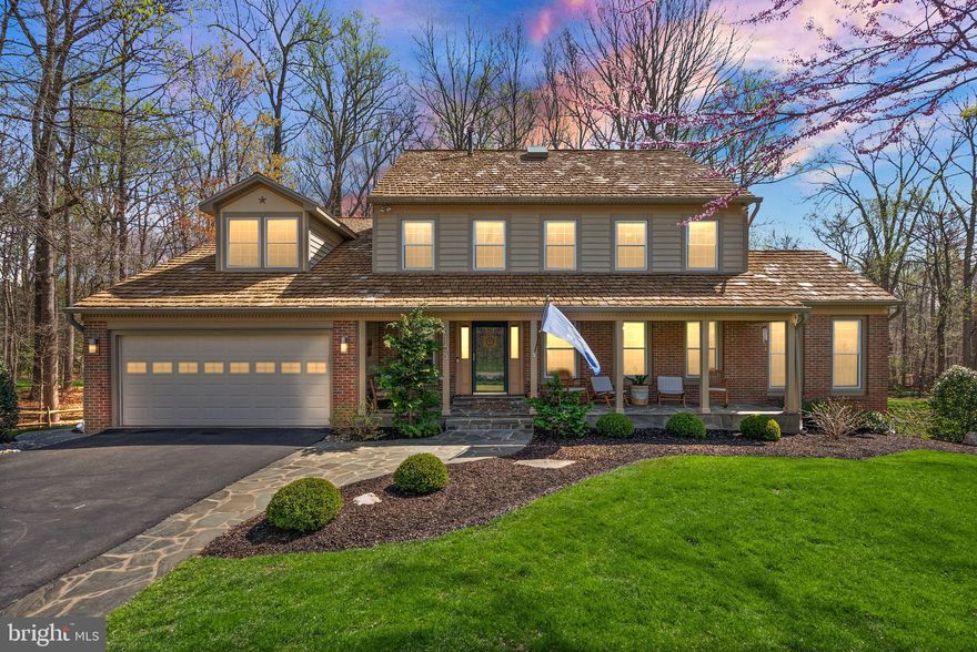 OPEN HOUSE CANCELED! Nestled on a prime, partially wooded .8 acre lot in the sought-after Pohick Station subdivision of Fairfax Station, this exquisite former model home offers an unparalleled blend of quality, elegance, and modern convenience. Spanning approximately 4,100 square feet of meticulously maintained living space, this four-level residence features five bedrooms and 4.5 bathrooms, making it a perfect retreat for both relaxation and entertaining.

Every detail of this home reflects superior craftsmanship, from the Cedar Shake roof to the Red Oak hardwood floors that flow throughout. The family room showcases custom White Oak shelving, while the heart of the home—a stunning $100k+ kitchen renovation—contains custom solid Cherry wood Omega cabinetry with soft-close doors and drawers, miles of granite countertops, and a premium JennAir stainless steel appliance suite. This includes a built-in 42" French Door refrigerator, a 6-burner gas cooktop with a pot filler, a commercial-grade exhaust hood, double wall ovens, and a built-in coffee bar featuring an antique Italian Oak cabinet imported from Italy!

Enjoy cozy evenings by the wood-burning fireplace in the family room or unwind by the gas fireplace in the sunroom, where you can take in serene views of the lush natural surroundings, or walk out onto the bonus deck. From the family room, the party flows outside to an entertainer’s paradise featuring a multi-level deck, a screened-in gazebo, and a large fieldstone patio with a fire pit, all set within a .8 acre fenced-in lot offering privacy and tranquility, with plenty of room to romp and play whether in the yard or on the playground set. 8 foot stock tank pool can convey. Hot tub more your style? Power is set up and ready for that too!!

Upstairs, the cavernous primary bedroom suite takes your breath away with its vaulted ceiling and cedar walk-in closet, leading to the skylit primary bath. 3 other amply-sized bedrooms share a hall bath on this level. Go up the private stairs to the 4th level to find the 5th bedroom with a Murphy bed and full en-suite bath! Perfect for a guest room and/or a home office!

The walkout basement is where the fun continues, with a huge rec room complete with wetbar, extra fridge, and built-in beverage coolers. When you walk out to the patio, don't miss the bonus storage room with exterior access around the corner! 

Ideally located near Burke Lake Park, close to shopping, and close to the Virginia Railway Express and commuter routes to local airports, Washington, D.C., and the Pentagon, this home is also part of the highly acclaimed Robinson Secondary High School district. Truly turn-key, 6165 Pohick Station Drive is a rare gem—offering timeless charm, modern upgrades, and an unbeatable lot and location.

Schedule your private showing today - Don’t miss the opportunity to make this exceptional property your own! And be sure to check out the virtual tour!