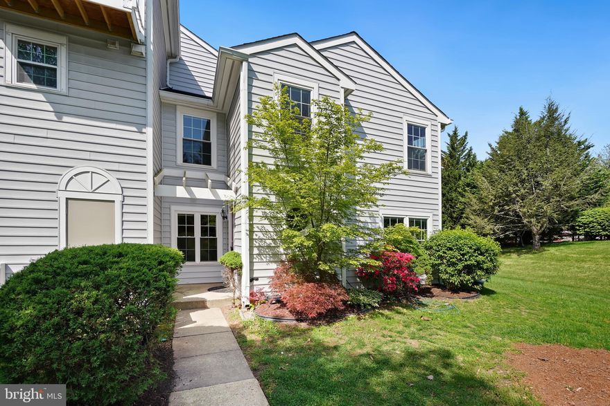 Welcome to this beautifully updated end-unit townhouse, perfectly positioned next to a spacious open area offering extra privacy. This charming home features 3 generous bedrooms, 2 full baths, and 1 half bath, with a thoughtfully designed layout that includes separate living and dining rooms — ideal for both everyday living and entertaining. The living room boasts a cozy fireplace and rich hardwood flooring that extends through the main living area. Step from the dining room onto the back patio, perfect for outdoor gatherings or quiet morning coffee. The renovated kitchen shines with new cabinets, stainless steel appliances, new flooring, and a sunny eat-in space. Upstairs, you’ll find brand new carpet throughout, an updated second-floor bathroom, and ample closet space in every bedroom, plus a convenient linen closet. With its blend of modern updates, comfortable living spaces, and a prime end-unit location, this home is a must-see!