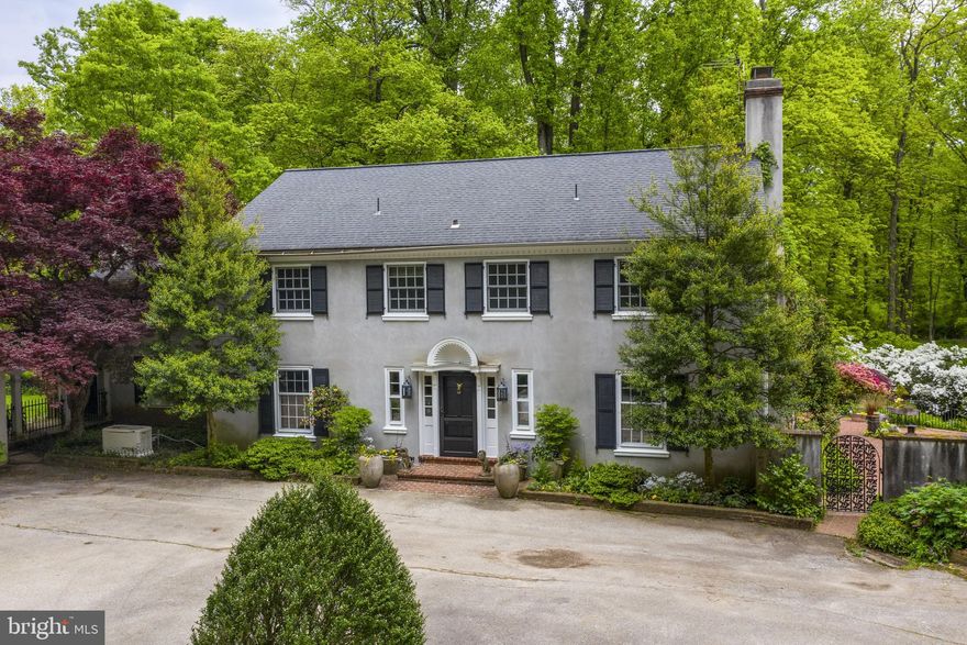 This property is a rare find in Easttown township! Situated on 19 acres of beautiful and private land, this stately colonial home is surrounded by woods and ponds. Close to everything, but set back down a winding drive, this land and lovely setting with surroundings is protected by Brandywine conservancy. You will have complete privacy to enjoy all the beauty nature offers. This home is a must see with many special features including gorgeous mouldings and woodwork and hardwood floors throughout.  Enter the front door into the entry hall with brick flooring, and gracious staircase with wainscotting.  Step down into a huge living room with an impressive fireplace, chair railing and french doors leading out to a pergola covered flagstone patio. The equally large dining room will provide space for formal entertaining  and features a fireplace with marble surround, flanked by deep window seating, and more french doors to the patio. From here, go through to the neutral eat in kitchen with white cabinets, plenty of counter space, double ovens, with pretty views from your window and a door with yet another access to the backyard and patio. Tucked behind the kitchen is a family room with vaulted ceiling, wood beams, fireplace and steps to a fabulous loft area outfitted with built-ins and used previously as a cozy library. This space also has a full bath and laundry room and can easily be used for a first floor master/in-law suite, if desired. Also on the first floor is a home office with wainscotting, build in shelving and hallway half bath. Upstairs there are 3 large bedrooms sharing a hall bath. The master suite at the other end of the hall is large, with a fireplace and a "juliet"  balcony overlooking the patio, pool, and ponds. Outside, there is a front courtyard, detached 2 car garage with fenced in side area and additional space for parking just outside the courtyard. A whole house generator has been installed by the owner. Decorative arched wrought iron gates lead from the courtyard  to the backyard, flagstone patio and pool. Overlooking the patio, set down the steps are three ponds that are feed from a meandering stream. Waterfalls and bridge walkways entice you over to the ponds. The middle pond is home to a group of large koi fish. The home was originally built by the owner, whose family gifted them the land. The land has been in the family for over 100 years.  Close to EA, Newtown Square, Paoli, and Wayne. Awarding winning Tredyffrin-Easttown School District. Truly a special property, to be cherished and passed onto the new owner.