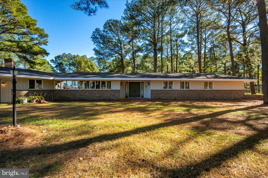 Beautiful Waterfront Home in Annemessex Ridge!! Home is over 2500 sq ft and sits on 3 lots.  Home has had many upgrades and renovation done.  New roof has been put on 2025, freshly painted inside and new flooring. The kitchen has beautiful cabinets and granite counter tops. Tons of cabinet and counter space.  The large living room has a gas burning fireplace. There is a nice family room with water views. The oversized porch is a great party room looking out over canal. The master suite is LARGE, with his and hers closets and master bath.  There are 2 more very large bedrooms and 2 baths.  The patio off the back of house leads to the dock and pier for your boats or jet skis!!