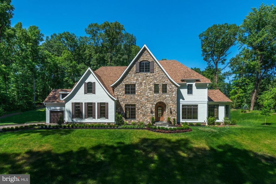 Brand-new custom residence in Langley Forest! Lush, private setting featuring an open layout with gourmet kitchen opening to both family and sun rooms. Expansive master suite with fireplace, dual walk-in closets & lux master bath. 4 add'l bedroom suites up. Lower level with recreation room, wine cellar, wet bar & 6th bedroom suite. Large backyard with patio. 4-car garage with pet washing station.