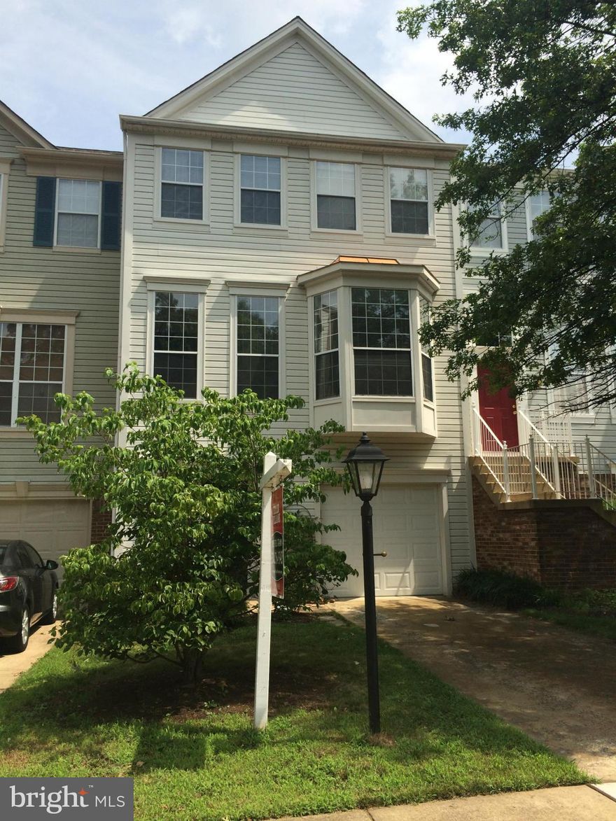 3BR/2.5BA 1 car garage TH located in sought after Cascades! Private large deck backs to trees. ML wood floors- large open kitchen- separate eating area leads to a formal dining room. Living room w/gas FP- floor to ceiling windows. UL with plenty of BR and closet space! Great LL family room leads to back yard! Located close to schools/shops & commuting routes!