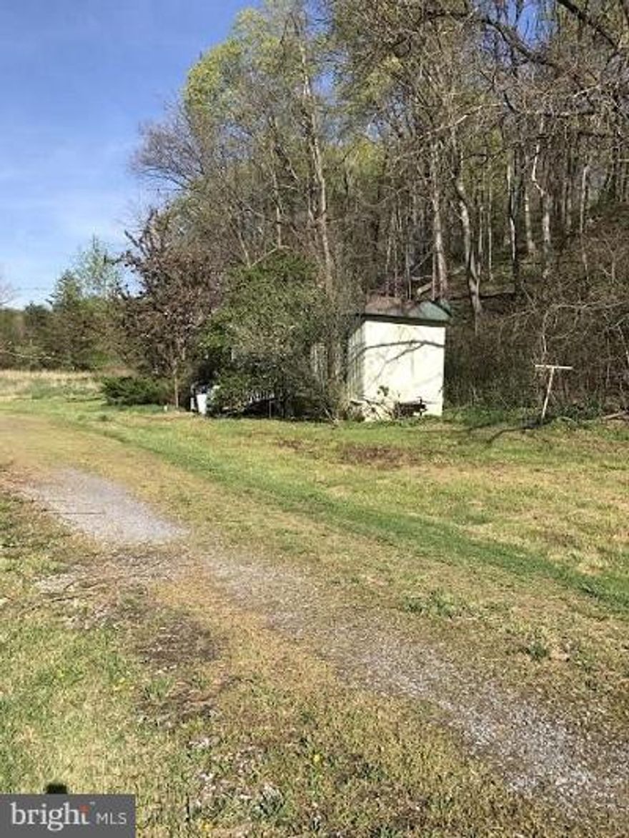 Freddie Mac Home Initiative for owner occupants through 08/04/2017. EMD must be certified funds payable to Century 21 Braddock. With over 8 acres this property has many possibilities. Property has 3 mobile homes on it that are not considered repairable. Property has well and septic. Most likely will be cash only.