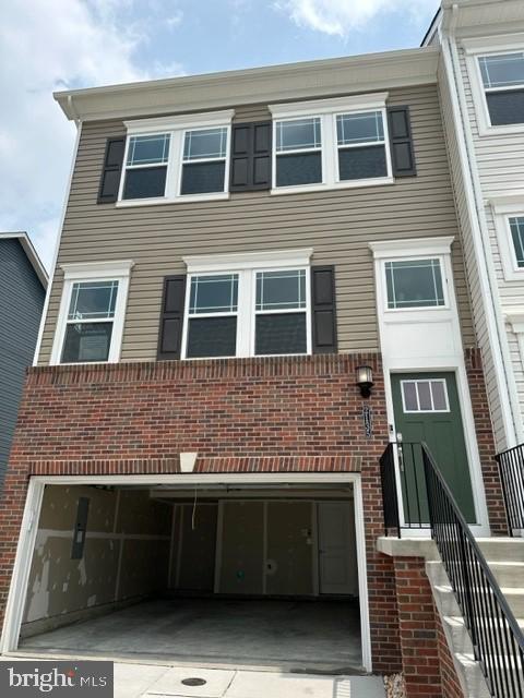 Very popular, Ellicott 2 car rear garage available for July delivery, home is under construction, end homesite, 2.5 bath and 2 car garage, 20x10 deck off kitchen level, large kitchen island with granite countertop and stainless steel kitchen appliances, and so much more!!! Stop by the model home located at 2013 Patapsco Glen Rd, Baltimore, MD 21244 for all information and to schedule a tour of the new home under construction. Photos are for illustration purposes only.