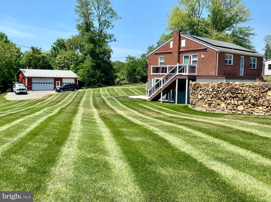 Completely Remodeled 3 Bedroom 2 Full Bathroom Rancher with FULLY Finished Lower Level and walk-out entryway. Head inside on the Lower Level to Gorgeous Tile Flooring, Full Bathroom, Sitting Room or Office, Oversized Laundry Room and Enormous Bedroom Space. Or travel upstairs to Beautiful Hardwood Floors that continue throughout both Upper Level Bedrooms and Living Room. Fully Updated Kitchen with New Appliances and Large Full Bathroom. Exterior provides wrap-around Trex Deck with descending staircase to Lower Level Slider. PLUS Pole Building with 2 Car Bays and Attached Shop. Measures roughly 30' x 40'. Minutes from Georgetown to enjoy the Sassafras River, Marinas, Restaurants and Fine Dining. Right on the Kent County Cecil County line, you're going to love your piece of privacy with modern updates.