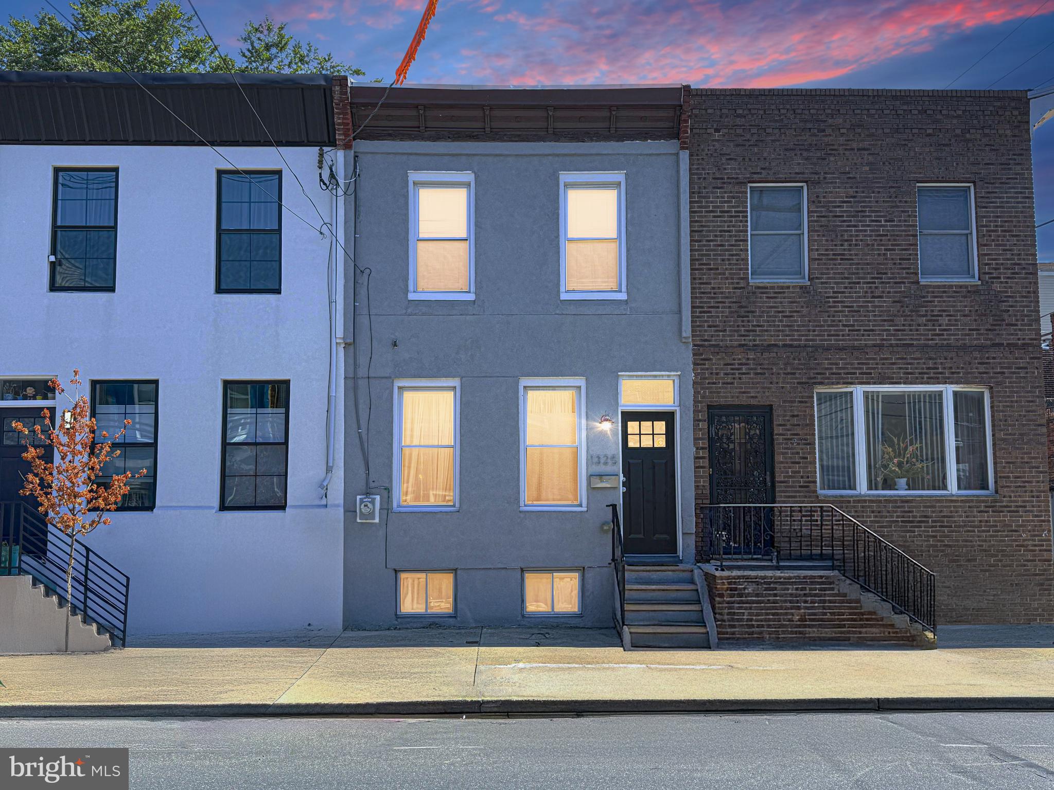 Welcome to 1325 S 22nd Street, a beautifully updated 3-bedroom, 1.5-bath home in the heart of Point Breeze. This spacious rowhome blends modern updates with thoughtful design, creating a property that’s both stylish and functional.
Step inside to an open-concept main level featuring high ceilings, recessed lighting, and wide plank waterproof floors. The living area flows seamlessly into a modern kitchen with white shaker cabinets, granite countertops, stainless steel appliances, and ample cabinet space. Just beyond, you’ll find a convenient main-level laundry room and a half bath.
Upstairs, you’ll find three generously sized bedrooms, each with recessed lighting, modern ceiling fans, and hardwood floors. The extra-large full bathroom offers storage and comfort without feeling crowded.
The finished basement provides a flexible space for entertaining, relaxing, or working from home, while the separate rear storage room is ideal for seasonal décor, furniture, or hobby supplies. Outside, enjoy a large fenced-in patio—perfect for entertaining, grilling, or cozy fall evenings by a fire.
This home has seen significant updates, including a new roof (2022), new laminate vinyl plank throughout (2024), upgraded electrical wiring (2025), new main plumbing line (2023), new carpet in the basement, new faucets and fixtures, and much more. Thoughtful touches like a shiplap accent wall, new stair finishes, and freshly painted doors and trim bring added warmth and character.
Highlights include the abundant natural light from its western exposure, the spacious primary bedroom that fits a king bed with ease, and the unbeatable location—within walking distance to South Street, Rittenhouse Square, and the Schuylkill River Trail. Schedule your showing today and see why this home is the perfect fit.