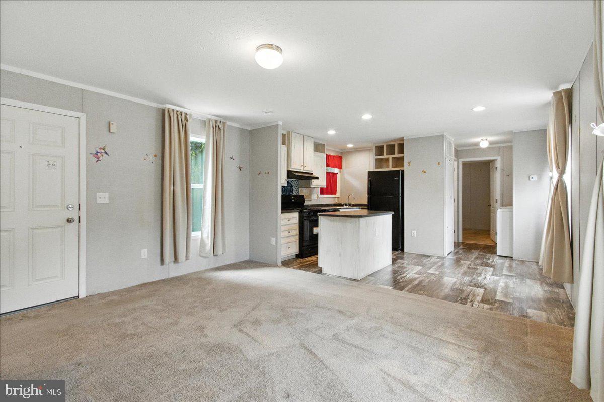 Don’t miss this opportunity! This 2022-built, 2-bedroom, 2-bath home is spacious, full of potential, and ready for your finishing touches to make it sparkle. Enjoy an open floor plan with a seamless flow from the kitchen to the living room, a convenient laundry room, and well-appointed bathrooms. Step outside to community amenities including a swimming pool, tennis courts, and a large tot lot—all within walking distance. A generously sized storage shed provides plenty of space for your belongings. Buyer must be approved by Boones Estates.