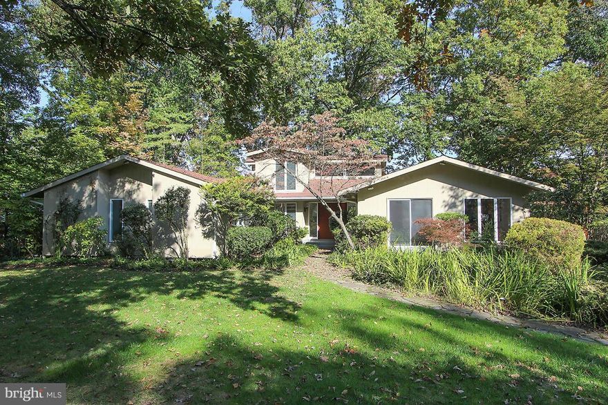 Priced to sell! True Contemporary  private treed lot.Open floor plan with 4 Bedrooms  on main level, 5th bedroom and full bath  on lower level. Great loft & tons of natural light, updated kitchen with soapstone counters.  Family room off kitchen. Bring the outdoors in with the walls of glass, Car port and parking for 4+ cars.Whitman cluster, Generator. Also available for rent.