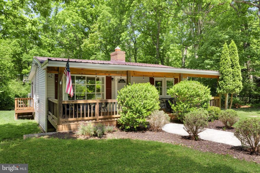 Charming two-bedroom, one-level cottage just minutes from downtown Luray and the Shenandoah River, offering the perfect blend of comfort, convenience, and natural beauty. Thoughtfully designed with bright, open living spaces, the home features durable luxury vinyl plank flooring, a well-appointed kitchen with granite countertops, a cozy gas fireplace, and central HVAC for year-round comfort.  Step outside to enjoy the inviting front porch, spacious stone patio, and private outdoor retreat complete with a hot tub and fire pit – ideal for relaxing evenings under the stars or entertaining guests.  This property has proven to be a strong short-term rental performer, generating approximately $68,000 over the past 19 months ($40,000 in the past year alone). Offered as a potential turnkey investment, the home can include an established property manager and cleaner for a seamless transition. A $1,000 buyer credit is available for continuing with the current property manager.  Furniture and hot tub are available for purchase, making this an easy plug-and-play opportunity for investors or second-home buyers.  Whether you’re seeking a peaceful weekend escape, a full-time residence, or an income-producing rental, this property checks all the boxes. See seller documents for detailed rental history and financials.