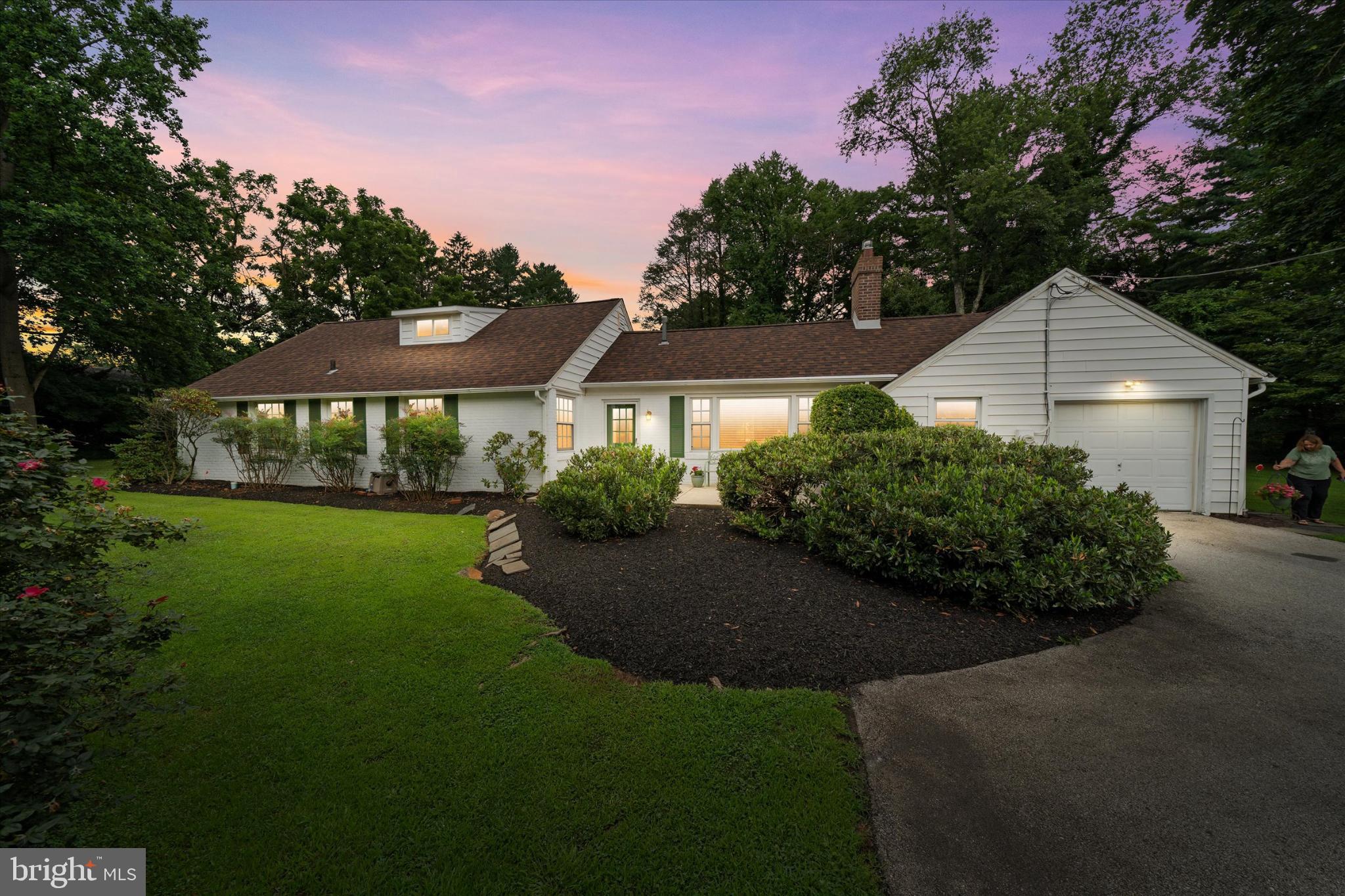 This charming home is nestled between Media and Swarthmore in the picturesque, historical borough of Rose Valley. Located on one of the most coveted tree lined streets in the area, it offers a serene retreat steeped in character and charm, and feeds into one of the most highly ranked and desired suburban Philadelphia school districts. This delightful 1950's Cape Cod-style home features a warm and inviting living room with a cozy fireplace flanked by built-in bookshelves, and an adjacent light-filled dining room with French doors that open out to the rear patio. The first floor also includes 3 spacious carpeted bedrooms; a full hall tile bath with shower/tub combination; and the eat-in kitchen with granite counter-tops, tile floor and ample cabinetry, along with a generous pantry and laundry. The 2nd floor features a private primary suite with new full tile bath and walk-in closet. The backyard offers a refreshing in-ground pool, surrounded by a beautifully maintained fenced yard, creating an ideal space for outdoor entertaining and relaxation. With its timeless design and inviting outdoor space, this home is a perfect blend of comfort and style. Conveniently situated near the fabulous Rose Valley Swim & Tennis Club, the Springhaven Golf Club, Rose Valley Museum, Ridley Creek State Park and the Hedgerow Theatre, this vibrant community offers an abundance of recreational opportunities filled with activities and natural beauty. New natural gas HVAC (2015) & New Roof (2023)