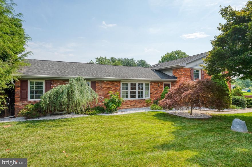 A very spacious Brick Split level with 4 levels located in the private community of High Point Manor, and in the Fallston Middle/High school district. This home includes a 2-story oversized detached garage with storage loft and 2 sheds. Inside, you will find hardwood floors in the Living Room and Breakfast nook, updated Kitchen with new stainless steel appliances, granite, and white cherry cabinets. A First level Master Suite with walk-in closet, updated bath and shower, with it’s own private washer and dryer. Upstairs you will find 3 spacious bedrooms with an updated bath w soaking tub and separate shower. Downstairs, for entertaining, you will find a very large 27 x 19 Family room with a quartz topped wet bar and beverage cooler. During the cold months, enjoy this large area with a wood burning fireplace. Through the French doors you will find a well lit 3 season sunroom that leads out to a deck. Relax on the patio by a custom in-ground concrete saltwater pool, with a new variable speed pump and an in-ground self cleaning system. The fenced in yard with scenic views and wildlife, on nearly an acre of property,  is a MUST SEE! Down in the basement level you will find a finished room with a half bath, and a laundry room with stationary tub. Updates include new carpet (2022) upstairs, in the master suite and family room.  New Water heater (2022) 220V EV outlet (2019) Stainless Steel appliances (2020) Intelliflo variable speed pump (2019) Window world double pane windows upstairs, living room, all bedrooms, baths, and family room.