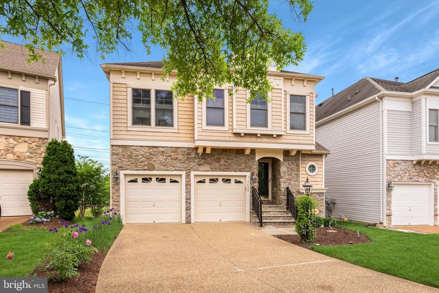 Welcome to 5620 Tower Hill Circle, an amazing expanded stone-front Ashmore model built by Porten Homes in Alexandria’s always desirable Kingstowne! Walk in and prepare to be dazzled! This is a beautiful contemporary home with a very open floorplan, 5 potential bedrooms and 3 and a half baths. The showstopper is the rear bump-out done in 2018 with its huge custom wall of casement windows with transoms beneath providing endless views of the naturalized common area in back and plenty of natural sunlight. The two-story foyer impresses with its chic chandelier and ceiling medallion at the top of the sweeping staircase. There are dazzling hardwood floors on the main level, the steps and the upper level hall. The living room has a charming in-wall gas fireplace. There’s chair rail and crown molding, and a modern chandelier in the large formal dining room. The spacious chef’s kitchen is a “wow” also. It features modern white soft-close cabinetry with stainless hardware, fashionable backsplash in a subway pattern, sleek quartz counters, premium stainless appliances including a Faber range hood, a large center island with lots of storage and stunning contemporary light fixtures. Step out from there and descend to the awesome stamped concrete patio perfect for grilling, relaxing and entertaining! On the upper level, the fourth bedroom is currently showing as a sitting room adjacent to the owner’s suite which also features a tray ceiling, two walk-in closets and the “morning bar” with microwave, cabinetry, sink and beverage center. In the owner’s bath, you’ll see the Kohler jetted deep-soaking sub, separate shower with rainforest showerhead and a double-sink vanity. The lower level has an expansive rec room and an office which, with a wall and door, would easily be the fifth bedroom with its egress window and closet. There’s a full bath, laundry room with cabinets and utility sink and door walking out to the patio. The two-zone HVAC was new in 2017 and 2019 and the hot water heater was new in 2022. This fine property comes with the endless list of Kingstowne amenities - pools, gyms, community centers, sport courts, tot lots, 12 miles of walking trails and more! It’s also close to two Metro stops, two town centers and all commuter routes!