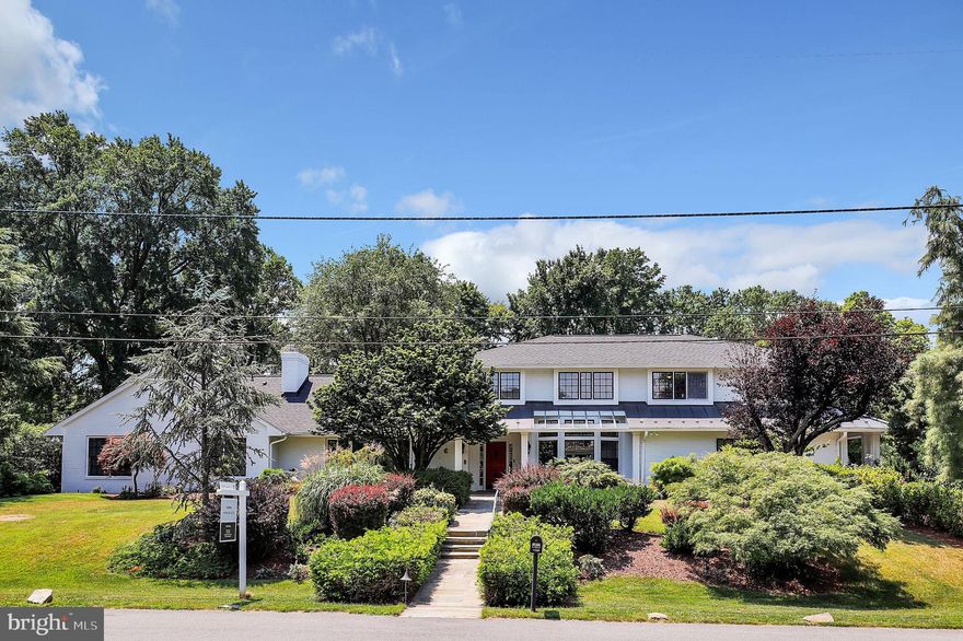 Welcome to this stunning 8-bedroom, 8.5-bathroom home that epitomizes luxury and comfort in the highly desirable Luxmanor community. Situated on 28,000 square feet of professionally landscaped grounds, this property offers a private oasis complete with professionally designed gardens, a water feature, and outdoor lighting. As you approach, you'll be captivated by the home's impressive curb appeal. The thoughtfully renovated interior creates abundant space for family living and gracious entertaining. The home boasts high ceilings, walls of windows, Zen gardens, and exquisite architectural details, all contributing to its California contemporary allure. Upon entering the main level, you are greeted by a welcoming foyer that seamlessly flows into the expansive living spaces. The dramatic cathedral ceilings and oversized windows flood the home with natural light, while refinished oak floors and recessed lighting enhance its elegance. The stunning living room spans from front to back, offering amazing garden views through a wall of windows and is complete with a bar. The formal dining room is sure to impress, and the updated gourmet kitchen features ample cabinetry, stainless steel appliances, and a massive center island with seating, opening to a family room with built-ins and a fireplace. This level also includes three bedrooms, three and a half baths, and a convenient mudroom/laundry area. The upper level hosts five spacious bedrooms and four full baths, providing ample space for family and guests. The lower level offers a large recreation space with built-in shelving, a bar, a bonus room perfect for a gym or office, a second laundry area, three expansive storage spaces, and a utility room. Hot water heater and HVAC converted from Oil to Natural gas and Electric in 2019 - 4 New HVAC units.  New roof. A few windows will be replaced! This home is conveniently located near major transportation and the Red Line Metro, as well as shopping, dining, and more at nearby Pike & Rose, Wildwood Shopping Center, Whole Foods, Starbucks, and other attractions, all while maintaining a charming neighborhood feel. Enjoy the vibrant community with numerous amenities and activities year-round, including a community pool, active swim team, tennis courts, a local park, and hiking trails. With proximity to unlimited shopping, dining, and entertainment venues, this unique home offers the best of North Bethesda living!