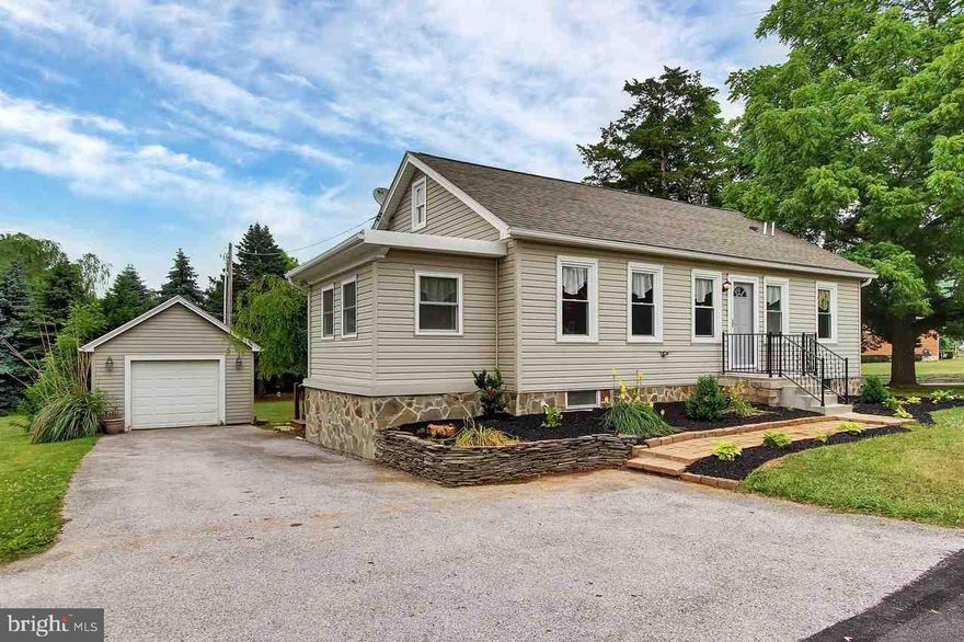 Wonderful spacious rancher w/loads of pizazz. Large yard, garage, finished basement w/half bath, custom kitchen w/vaulted ceilings, all new paint and flooring, possible 4th bedroom in lower level, gorgeous bath w/marble floors and high end built ins. Call today for a showing!!