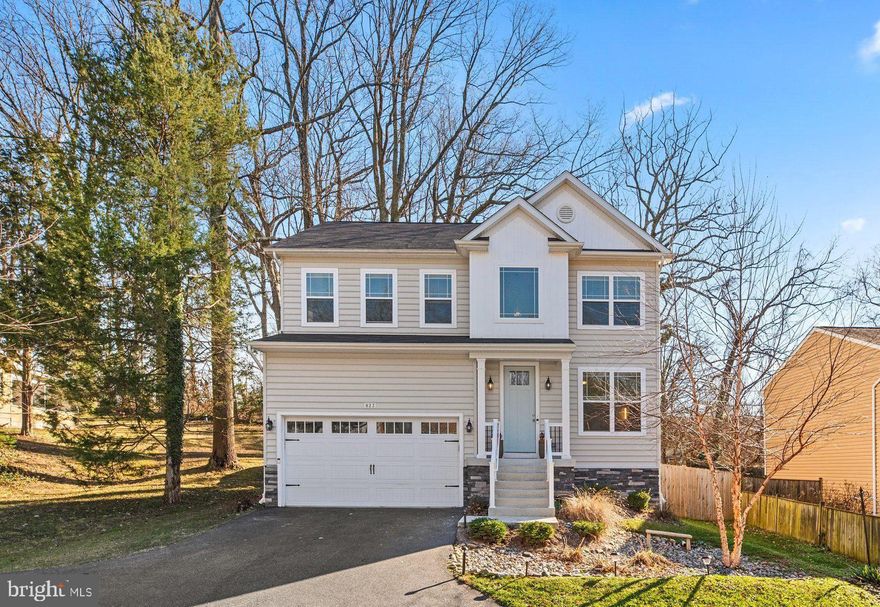 Welcome home to Cape St. Claire! Move right in to this stunning newer construction home completed in 2020. Designer touches throughout this 4 bedroom home with 3 full plus 1 half bathrooms and over 2,700 sq ft of finished living space across 3 levels. You'll immediately appreciate the grand, oversized front door welcoming you with a 2 story foyer, designer neutral paint and luxury flooring throughout. Open concept main living level with bright, sun filled rooms. A chef inspired kitchen offers stainless appliances, high end back splash, quartz counters, a large center island with seating and plenty of cabinets. Flowing seamlessly from the kitchen is the dining area and great room with a cozy gas fireplace and glass door to the private, fully fenced rear yard and patio. The main level additionally features a formal living room, a half bathroom and access to the garage and basement level. Travel up the grand foyer to the bedroom level complete with a full laundry room for the utmost convenience. A tranquil primary bedroom suite is sure to please with its large size, tray ceilings, walk in closet and private super bath with tiled shower and soaking tub besides a dual sink vanity. 3 additional, generously sized bedrooms all with fantastic closets and a full hallway bathroom complete the upper level. The lower level offers more living space with a bonus rec room, custom work out room, home office and newly completed full bathroom with plenty of storage and wide walk up stairs to the private rear yard. There is no shortage of space in this modern home. Ample parking with a front loading 2 car garage and bonus parking pad. Just a short walk to schools, beaches, playground and the clubhouse. Broadneck School District. Close to shopping, dining & entertainment with easy commuter access. Schedule your private tour today!