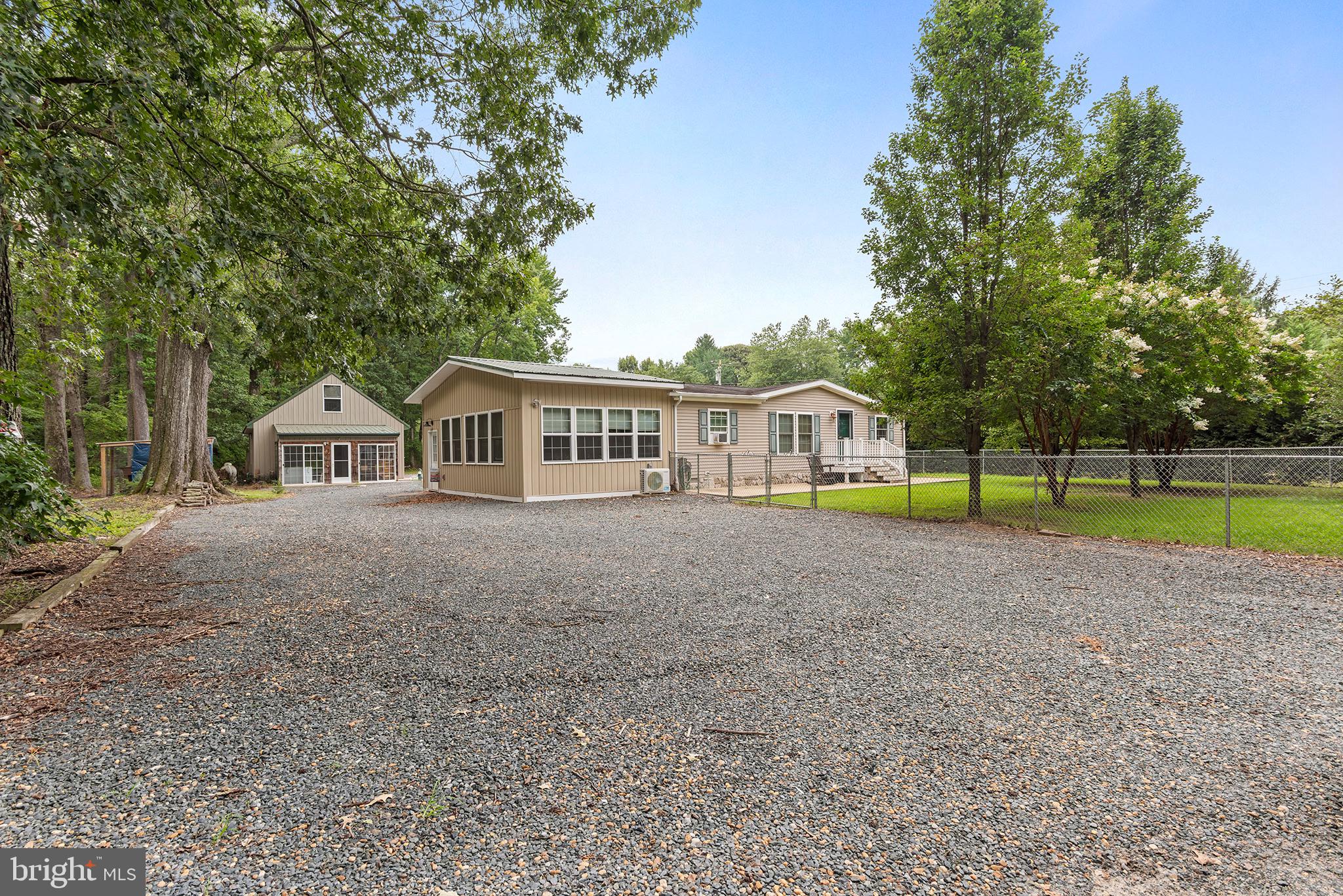 PROFESSIONAL PHOTOS COMING! Showings start 8/9
Looking for a home that has an oversized two car garage with electric, heated floors, water, toilet hookup bonus room above and a heated Florida room? Or are you looking for a one story home with hard wood floors, a huge bonus room with heated floors and an updated kitchen all within a mile from a public ramp? You found it! Store your water toys, camper or hunting gear here! The large drive through driveway makes it simple to maneuver your large toys around as it attaches to Broad Neck and Lovely Lane! If needed, the home has a whole home generator along with an updated BAT septic system in 2015! No fear of damage in the craw-space as it was encapsulated for piece of mind! Keep your pets & those close to you safe with fencing around the home adorned by arborvitae’s for privacy! Need to work from home? No problem, it’s easy to do with talkie fiber optic internet! Within 10 minutes from downtown Chestertown, 15 minutes from Rock hall, 40 minutes from Middletown DE, 1 hour 30 minutes from the Philadelphia International Airport & 1 hour 30 minutes from BWI. Start your small town country living now! PLEASE NOTE, THE PUBLIC LANDING IS AT THE END OF BROADNECK RD AND NOT LOVELY LANE. DO NOT ENTER ANY PRIVATE STONE DRIVEWAYS.