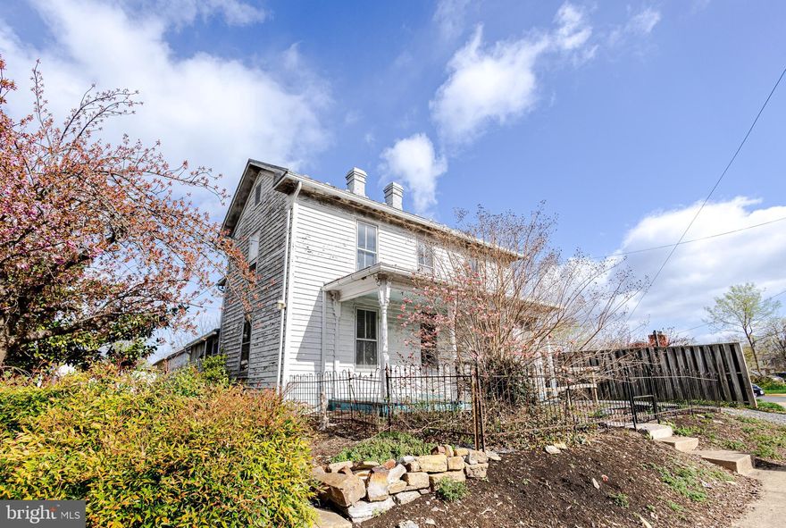 Opportunity awaits! This gem is ready to be restored. Beautiful hardwood floors and many charming features grace this two-story home in the historic district of Stephens City, VA. The home includes a front and side porch, a living room, a den, a dining room, and a kitchen on the lower level. Upstairs, there are three bedrooms, a bathroom, and a laundry room. The large, in-town 0.52-acre lot provides room for outdoor activities or gardening. Sold As-Is. Iron fence is excluded from the sale, and has been removed.