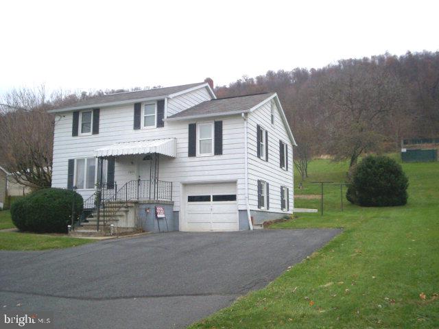 Enjoy the family room with a nice warm wood burner and watch the deer from your patio everyday; great home