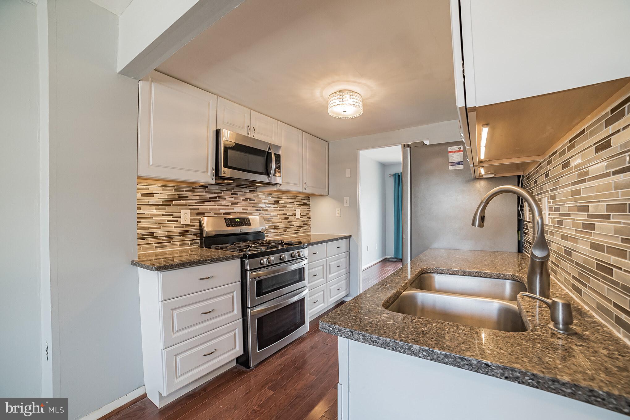 Available to Rent! Updated 3 BR Colonial Townhome located in Crofton Meadows. Great location & convenient to the Waugh Chapel shopping center, restaurants, and NEW Crofton High School District. Bright & Open concept living, updated Kitchen with Quartz countertops , Stainless Steel Appliances, and Cabinetry w/under cabinet lighting (2015). Upper level offers 3 Bedrooms & Remodeled Master Bath & Shower in 2020. Fully Finished lower level, Recreation Room with built-ins, Cabinets and Counter Area, Office or Playroom. Newly added 3rd Bathroom, Luxury Vinyl Flooring & Carpet in 2018. Plenty of Storage space. Enjoy the entertaining in the backyard, Stone patio w/Privacy fence. Roof 2018 & Water Heater 2015. Ecobee Thermostat 2018. HOA includes: Community playground & Lake. 1 Parking space assigned & an additional with hang tag for 1st come 1st serve. Apply at the link: https://www.longandfoster.com/rentals/1908-Cambridge-Drive-Crofton-MD-21114-311182740