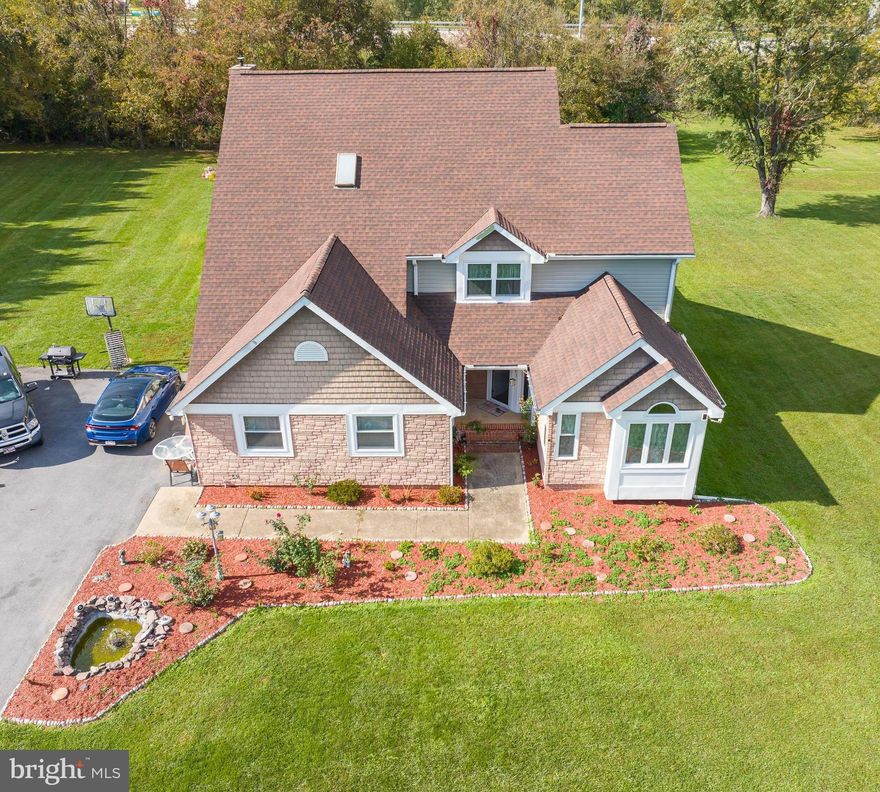 GREAT COMMUTER LOCATION! Easy access to Northern VA and Frederick County! 
This spacious, unique house in Jefferson County has it all! Upon entering, you are greeted with a bright, 2 story foyer.  A large eat in kitchen, a formal living room, large family room, dining room, laundry area and half bath complete the first floor.  Upstairs, you will find 4 large bedrooms, including a primary with ensuite bath.  Another full bath is centrally located for the other 3 bedrooms.  Outside, there is a large inground pool (new liner 2023), and a large building that could be finished to create more living space with an awning to provide shade.  The pool area is enclosed with a 6 ft vinyl privacy fence.  The large, 2 acre lot is tucked back at the end of a cul-de-sac giving the entire property privacy. Roof, gutters, and windows were replaced in 2018.
MOTIVATED Seller-bring all offers