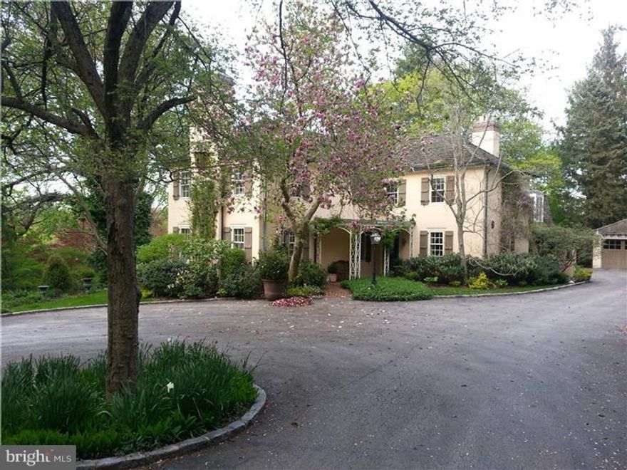 "PRIVATE"   Through the gates and down the scenic drive to this exquisite 6 bedroom 4.5 bath house on a breathtaking 2 acre secluded lot with views seldom found on the Main Line.   First floor boasts: Large Living Room with  a gas fireplace and french doors leading to an over sized terrace, Formal Dining Room with french doors, granite eat-in kitchen with island, gas cook top, double ovens and all of the amenities,  huge step down family room with glass wall overlooking the expansive views, study with gas fireplace and wet bar, powder room and laundry/mudroom.    Second floor:  Fabulous Large Master Bedroom suite with gas fireplace, full bath with double sinks, over sized shower and large office/bedroom,  2 additional large bedrooms adjoined by a Jack and Jill bath, bedroom with en-suite bath, an additional bedroom and  hall bath.    Two and a half car garage.  Large patio overlooking the private yard in this incredible park like setting with mature plantings.