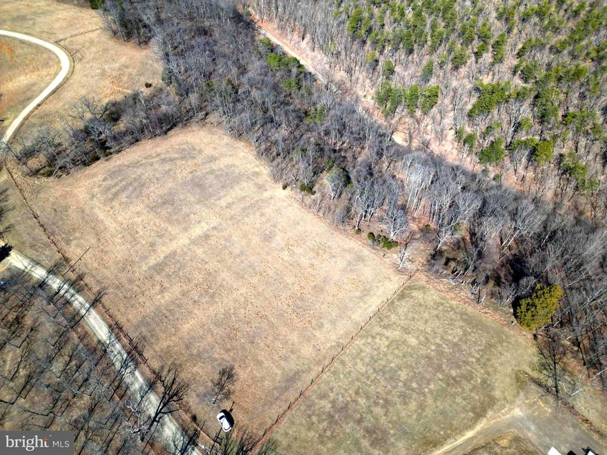 Discover your own slice of paradise with this 10-acre parcel of land, offering breathtaking panoramic mountain views and unmatched privacy. The entire property is fully fenced, providing a secure and peaceful environment to escape the hustle and bustle of everyday life. Nestled in a serene setting, it’s the ideal location for those seeking a tranquil retreat or a place to build their dream home. Imagine waking up each morning to the beauty of nature, with expansive views right outside your door. The land offers endless possibilities for creative use, whether you're envisioning a private sanctuary, an outdoor enthusiast's haven, or simply a place to enjoy the peaceful solitude that country living provides. And with just a short drive to town, all your shopping and essential needs are within easy reach, making this location the perfect blend of convenience and seclusion. Whether you're looking to escape to nature, enjoy starry nights, or create your own private oasis, this property is the perfect canvas. Don’t miss the opportunity to own this unique piece of land , where mountain views, privacy, and possibility meet!