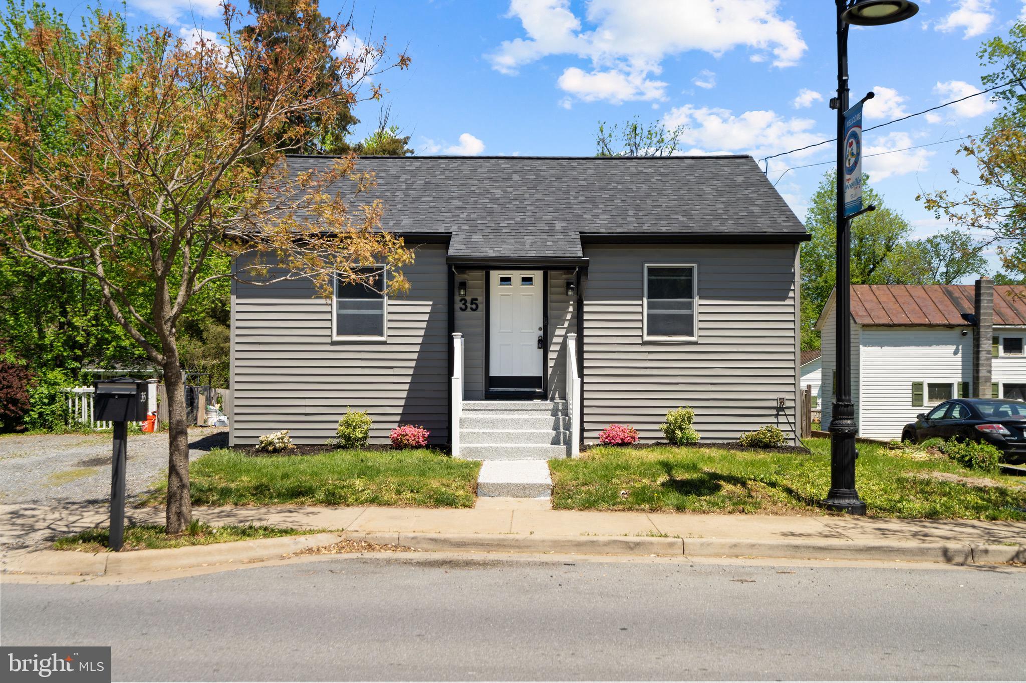 Nestled in the heart of town and just a short walk to charming shops and delightful restaurants, this cottage is the perfect cozy retreat to call home. Its two-bedroom, one-bath layout is perfectly suited for quiet living. The newly sided exterior boasts a modern yet timeless façade, while inside, the warmth of wood floors and soft lighting creates a welcoming atmosphere.
A brand-new kitchen featuring quartz countertops and a farmhouse sink is ready for intimate dinners at home. The finished basement provides extra space, ideal for a home office or a cozy den, while the bonus attic—with its sloped ceilings—whispers of potential for an artist’s studio or a secret hideaway.
Every corner of the home, from the intimate bedrooms to the airy living spaces, radiates comfort and character, making this charming cottage a truly special place to call home.
Accepting Back up Offers