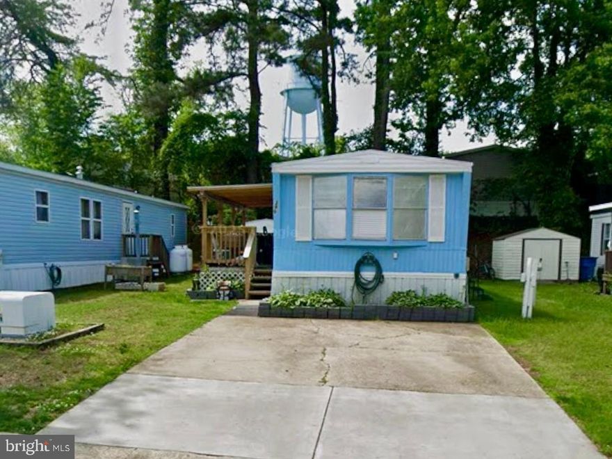 Welcome to 299 Rips Dr! This well-maintained 2-bedroom, 2-bathroom mobile home offers comfortable living with an open concept layout, generous natural light, and a functional floor plan. The eat-in kitchen features ample cabinet space and flows seamlessly into the living area — ideal for relaxing or entertaining. Both bedrooms are nicely sized, including a primary suite with a private bath. Enjoy the yard, plenty of parking, and a peaceful location close to shopping, dining, and major commuter routes.