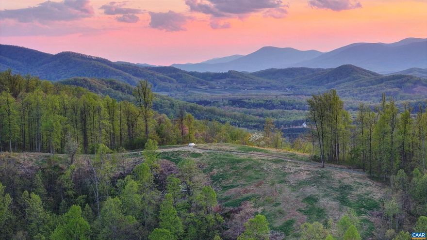 EXTRAORDINARY PANORAMIC MOUNTAIN VIEWS sweeping from The Priest Mountain south of The Wintergreen Resort north to Greene and Madison Counties. Utterly magnificent !! This totally private 107 + acre mountain top is protected under a conservation easement and offers 2 division rights each allowing a main house and a dependency. Property features include a beautifully preserved family plot, restored chestnut log cabin, a lovely, peaceful new pond, a stabilized chestnut cabin and other legacy features. The property starts at second unlocked red gate. Miles of trails including access to adjacent 2300 acre Bundoran Farm Trail system. There is an easy gravel driveway all the way up and electrical is buried half way up already.  This unequaled property awaitsits' new steward.,The Mountain Top