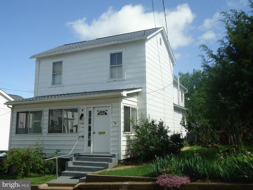 If you're looking for a convenient location, don't miss seeing this one with lots of potential and 2058 sq ft. at the right price. New roof in 2012, sun room addition, wood floors on both levels, 9' ceilings, dual staircases, full bath on each floor & efficient radiant heat. Imagine the possibilities in these large rooms with some updating! Fully fenced rear yard, and a 7' x 10' storage shed.  .