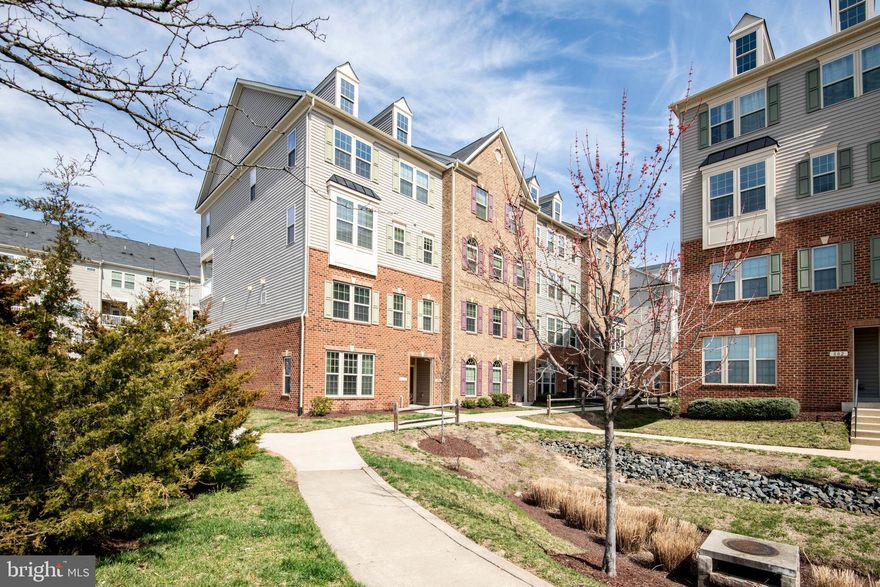 Welcome to 8033 Orchard Grove Rd, a home that makes everyday living feel effortless and well-designed. This end-unit townhome has been thoughtfully updated and exceptionally well cared for, with hardwood floors, fully renovated bathrooms throughout, custom-designed closets that maximize every inch of space, and a 1-car garage outfitted with a Proslat organizing system that makes the space look sleek, clean, and is incredibly functional. The main level is bright, open, and easy to live in, with a spacious family room flowing into the kitchen, complete with granite countertops, stainless steel appliances, and plenty of room to cook, gather, and stay connected. It’s the space where mornings start with breakfast at the counter, evenings wind down in the living room, and weekends naturally become time spent with friends and family. Upstairs, the primary suite is a true retreat with two oversized walk-in closets and a beautifully renovated ensuite bath. Two additional bedrooms, another fully renovated full bath, and a conveniently located laundry area round out the upper level. One of the secondary bedrooms opens to a private balcony, perfect for a little quiet time, morning coffee, or fresh air. And then there’s the location, which is hard to beat. You’re just minutes to the MARC train, making commuting into Washington, DC, Baltimore, or Fort Meade incredibly convenient. Piney Orchard Marketplace is right next door, so grabbing groceries, picking up dinner, mailing a package, or filling up your tank is all just a quick walk or short drive away. On beautiful days, it’s easy to take advantage of everything around you - bike the BWI Trail, head out for a walk through nearby parks and paths, or just enjoy being part of a community that offers both convenience and outdoor space. This is the kind of home where everything just works, from the updates to the layout to the location. Welcome home!