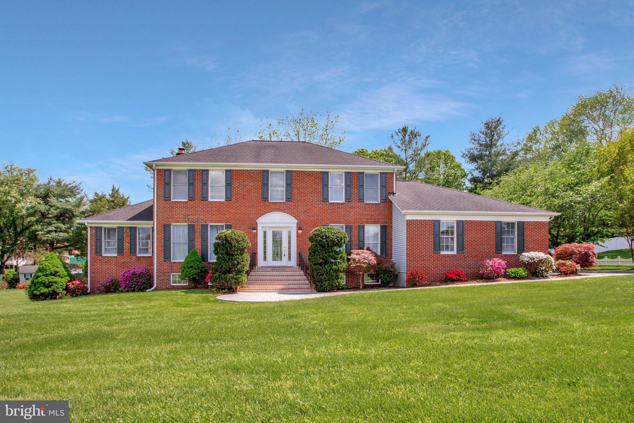 Idyllic Dunkirk location! Located in the quiet community of Calvert-Chase just off the beaten path of Route 4, this stately brick front home sits on a 1.05 acre lot that is flat and well maintained. This 5BR, 4.5 bathroom home has a large, traditional-colonial floorplan and a full finished basement. The basement includes a kitchenette, full bathroom, living area and bedroom all with brand new LVP flooring. The main level has entry from a 2 car side-load garage, main level BR or home office, open concept kitchen/living area with fireplace, formal dining room, formal living room AND a large sunroom! The upper level has all new carpet, fresh paint, 4 BRs and 3 FBs. The primary bedroom suite is big enough for large pieces of furniture and has an en-suite with shower, separate soaking tub, double vanity and private water closet. Step outdoors from the main living space to the very large deck with built-in area for a bar and gazebo. The deck and patio were designed for entertainment use including space for a hot tub and in-ground pool so if you're looking for an established home in a neighborhood and want to build your own back yard oasis, this is prime real estate! Home has had some recent improvements, new LVP flooring, all new carpet in all bed rooms, and fresh paint. This home is well-maintained, and is move-in ready while allowing room for a new buyer to put their personal touches in place.