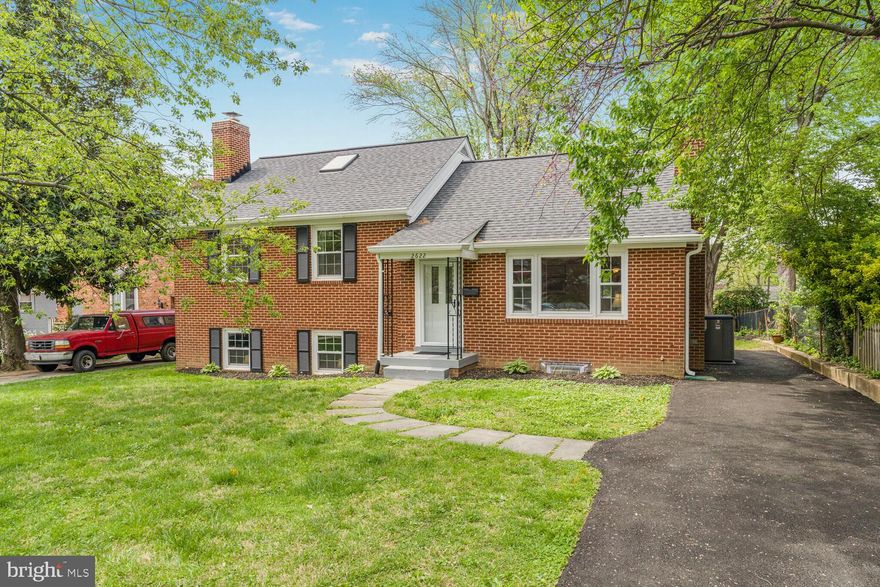 Welcome to this One-of-a-Kind Six-Level Home—Yes, Six Levels! Tucked away in the desirable Berkshire Oakwood neighborhood, this stunning all-brick split-level home is full of charm, character, and unexpected space. With five bedrooms, two full bathrooms, and two fireplaces, this home offers comfort, functionality, and style at every level. Step inside a bright, inviting living room with a large picture window that floods the space with natural light. A cozy fireplace adds warmth and charm, while just to the right, the formal dining room opens through elegant French doors to a spacious deck and beautifully landscaped, flat backyard—ideal for entertaining or enjoying a peaceful evening outdoors. The renovated kitchen flows seamlessly off the dining room and offers the perfect hosting or everyday living layout. A few steps down, you'll find a large family room with its fireplace and a full bathroom—a perfect retreat or guest space. Continue to discover a generous storage area, laundry room, and a cozy nook just waiting to become your custom wine closet or hobby space. The upper levels offer even more:  Three spacious bedrooms and a full bath on one level  An additional bedroom or office just above  And a top-level bonus room—perfect as a fifth bedroom, home office, yoga studio, or gym  With its flexible layout and endless possibilities, this home is ideal for today's dynamic lifestyle. The list of improvements is extensive: new roof, windows, gutters, freshly painted interior and exterior, the floor refinished, new carpet, and driveway, to name just a few of the improvements. This prime location is just minutes from shopping, dining, Route 66, Route 29, and a quick commute to DC and Tyson's Corner. Don't miss your chance to own this unique and spacious home in one of Arlington's favorite neighborhoods!