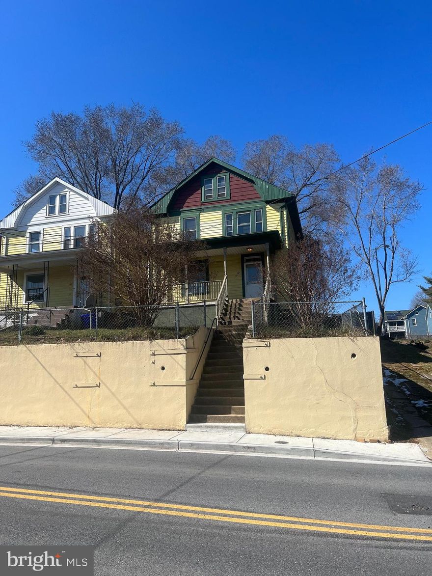 Discover the potential of this spacious 4-bedroom, 1-bathroom home, perfect for those looking to add their personal touch or investors seeking a versatile property. Located on a desirable corner lot, the home boasts off-street parking—an invaluable asset in this downtown area.  With some renovation, this property could transform into a delightful starter home or a lucrative investment opportunity. Hardwood floors lend a timeless charm to the interior, while the inclusion of HVAC ensures year-round comfort. The separate dining and living rooms, along with a spacious kitchen, provide functional living spaces. B3 zoning offers versatility for both commercial and residential purposes, expanding its potential for various ventures. This flexibility makes it an excellent choice for business owners or professionals looking to combine their living and workspace. Located in a convenient area, the property is just a short walk from local dining spots and shops. Commuters will appreciate the proximity to the Marc train station, providing easy access to surrounding areas, while outdoor enthusiasts will enjoy nearby leisure activities along the C&O Canal. Whether you're a first-time homebuyer ready to embark on a renovation adventure, or an investor searching for a property with significant upside potential, this home is a promising opportunity waiting to be realized.