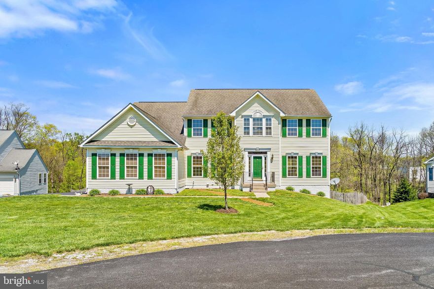 This once in a lifetime dream home could be yours!  Spacious home and spacious lot are ready for the next owner.  With 4,650 square feet of living space, there is room for everyone!  Central to the home is the large open kitchen featuring granite counters, center island and breakfast space.  Great room off kitchen is perfect for entertaining or hanging out.  Formal living and dining room spaces provide flexible rooms for what you need.  Upstairs, you'll find 4 generous bedrooms.  The Primary bedroom features a vaulted ceiling, huge walk-in closet and a spa bath with soaking tub, separate shower and the laundry.   3 additional bedrooms and hall bath complete the upper level.  The lower level offers so many options!  With multiple rooms, both a full bath and a half bath, as well as a full kitchen (stove, dishwasher, refrigerator, built in microwave and sink), the possibilities are endless - theater room, craft room, man cave, playroom, in-law suite or a combination of any of these!  All of this is just inside!  Waiting for you outside is a large deck and private fenced backyard - trees abound behind the .75-acre lot and with the location on a cul-de-sac , this is your own oasis!  Plenty of parking, too, with a 3 car garage and a long driveway.  The overall location can't be beat - close to the MARC for commuting, easy access to Harpers Ferry or Charles Town, or even Frederick MD, for shopping, dining and recreation.