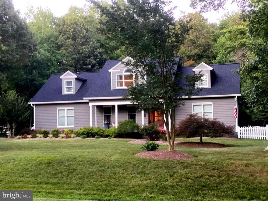 Beautiful home in Prospect Bay community.   Five bedrooms, three on the main floor with new modern kitchen, new roof, fireplace, porch and so many upgrades.  The home that you have been looking for.  Community offers golf, tennis, restaurant, boat ramp, playground, pool and so much more.