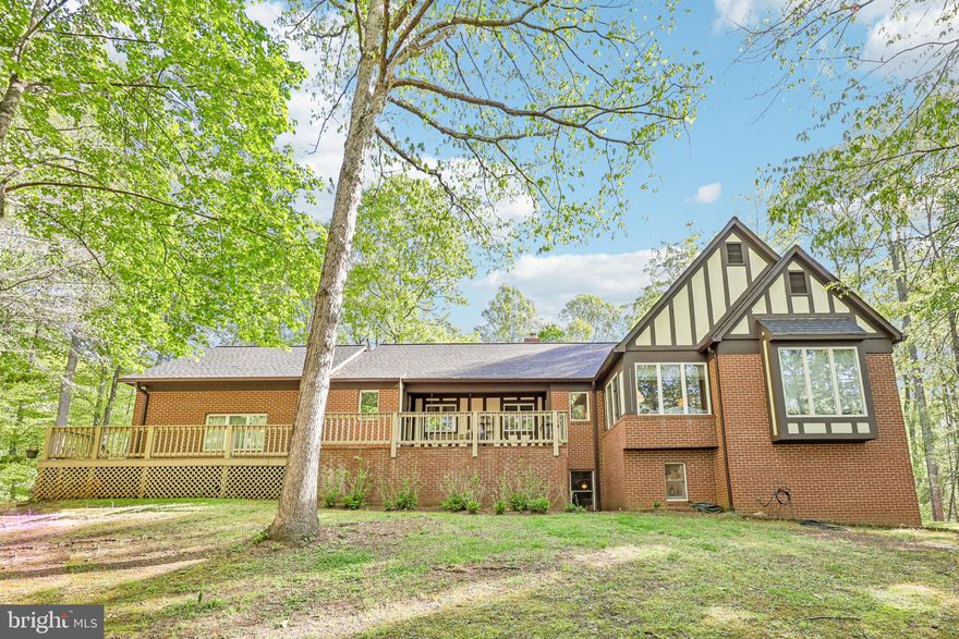 Welcome to 2015 Kelly Court in Amissville, a 4-bedroom home offering 3 full baths, set on a spacious nearly 2-acre mostly wooded lot in a quiet cul-de-sac setting with no HOA. Located approximately 7 miles from the Town of Warrenton, this property offers a combination of indoor comfort and outdoor functionality in a well-established neighborhood.

The home features a functional layout with multiple living areas, including a two-sided gas fireplace on the main level and two decks that expand the living space outdoors, offering a setting for relaxation or entertaining. The kitchen includes soapstone countertops, a wonderful coffee bar area, new mini subway tile ceramic backsplash, and updated stainless steel appliances (2023). Additional features include direct access from the garage into the kitchen and an exit door from the garage to the rear yard.

Enjoy the spacious walk-out basement complete with a full bath, bedroom or home office, rec room, wood stove, and built-in bookcases, providing flexible living and entertaining space.

Recent updates include a new asphalt shingle roof (2019), insulated garage doors and central vacuum hose and head (2020), septic system components (2022) with tank pumped in 2025, asphalt blacktop driveway (2023), luxury vinyl flooring (2024), and exterior wood painted between 2024–2025.

Additional features include an attached 2-car garage, private driveway parking for approximately 5–6 vehicles total, and an assumable VA loan available to eligible buyers.

The outdoor setting offers privacy, mature trees, and open space, providing a variety of potential uses. Conveniently located with access to shopping, dining, parks, and recreational opportunities, including nearby historic towns and regional attractions, this property offers a balance of rural surroundings and everyday convenience.