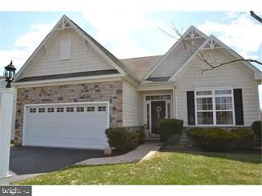 Experience move-in ready perfection at this pristine single-family residence, built in 2005 and situated in a premium location within a sought-after Collegeville community. This home showcases an inviting open floor plan with hardwood floors, wainscoting, cathedral ceilings, and an upgraded trim package throughout. The chef's kitchen features granite countertops, a center island, natural wood cabinetry, and stainless steel appliances, all flowing into a cozy breakfast nook with a pellet stove. Step into the elegant Great room with an additional Fireplace and sunroom with its beautiful tile flooring, palladium windows, and custom Hunter Douglas window treatments, which opens onto a spacious deck with an awning overlooking serene common space. The finished basement offers extra living space with a full bath and convenient walk-out access, along with additional storage rooms. Other interior highlights include a first-floor laundry, a large pantry, and stately columns. As part of an active HOA community in Skippack Township, residents enjoy access to a clubhouse, pool, gym, and walking trails. With a 2-car attached garage with inside access and close proximity to the charming shops and restaurants of Skippack Village, this home perfectly blends luxurious finishes with convenient, easy living.