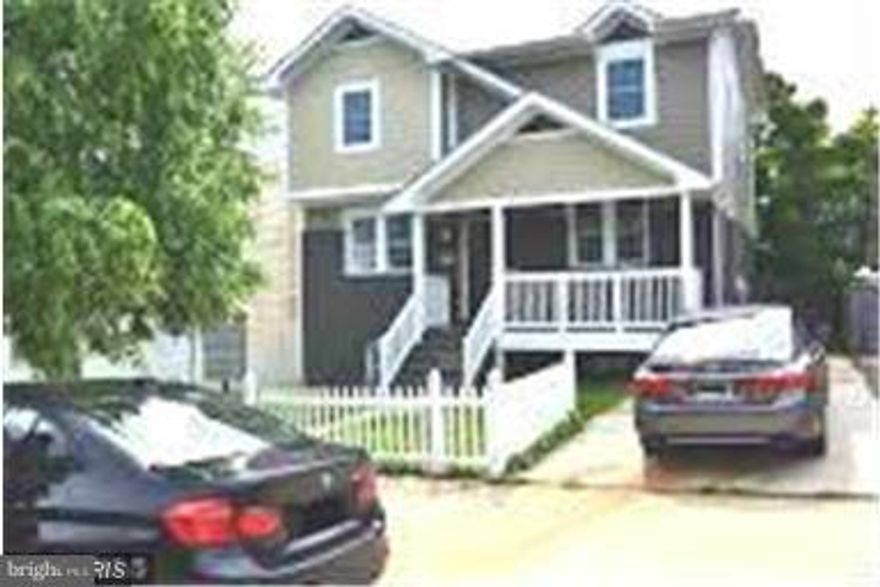 Beautiful, completely rebuilt and updated single family home. Second level with three bedrooms and two full baths has been added. Property has marble and granite thru out the kitchen, baths and basement flooring. Hardwood flooring thru out. New Stainless steel appliances thru out the kitchen and basement wetbar.