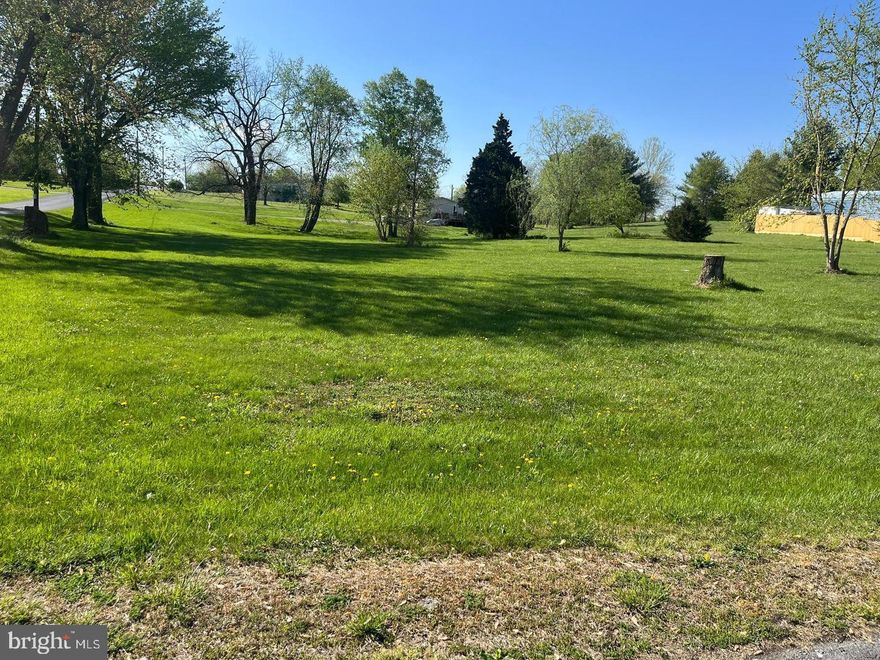 1 acre of beautiful land ready to build your new home on. Public water and sewer lines are nearby to hook into. Land is flat and mostly clear, Seller is removing several stumps to clean the property up a little for the new buyer! Come see the area and the property it's everything you've been looking for right outside of Spring Mills.