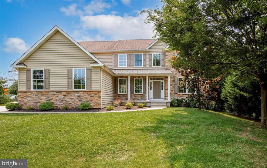 Nestled in the prestigious Lower Merion School District, this Villanova home is not to be missed! This extraordinary five-bedroom Colonial residence spans over 4,500 square feet of luminous living space, including the finished lower level. Step inside and be captivated by the two story foyer, gleaming hardwood floors, grandly proportioned rooms, and an exquisite modern open-concept floor plan. As you enter the main level of this magnificent home, you're greeted by an inviting living room and an elegant formal dining room, perfect for hosting countless memorable evenings. The journey continues beyond the light filled office into the expansive family room, anchored by a warm and inviting gas fireplace, creating a cozy haven for movie nights with the family.  The nearby chef's kitchen is a culinary paradise, featuring custom 42-inch maple cabinetry, gleaming granite countertops, double ovens, two sinks, and a wine refrigerator, ensuring every gourmet desire is met with ease. Just off of the kitchen you'll find a large breakfast room that exits to a side patio and into the rear yard. Adjacent to the kitchen you'll find a spacious mudroom that leads to the three car garage. Ascending to the second level, you'll discover the ultimate primary suite, a true retreat boasting tray ceilings, two spacious, custom walk-in closets, a private balcony overlooking the private, landscaped rear yard and a spa-like ensuite bathroom complete with a rejuvenating jacuzzi tub, and dual vanities. The third and fourth bedrooms are joined by a Jack and Jill bath, offering both privacy and convenience. The well-appointed laundry room completes this level, adding to the home's exceptional functionality. The walk-out lower level unveils an expansive recreational space, perfect for entertaining or unwinding, featuring a convenient kitchenette and a private fifth bedroom suite with a full bathroom. This stunning home also offers seamless access to local private schools, public transportation, major highways, and premier shopping destinations, including the renowned King of Prussia Mall and less than thirty minutes to Center City.  Smart home features are thoughtfully integrated, enhancing both comfort and convenience. This is truly a must-see home, combining luxury, elegance, and unparalleled amenities in one of the most sought-after locations. Don't miss the opportunity to call this magnificent residence your own!